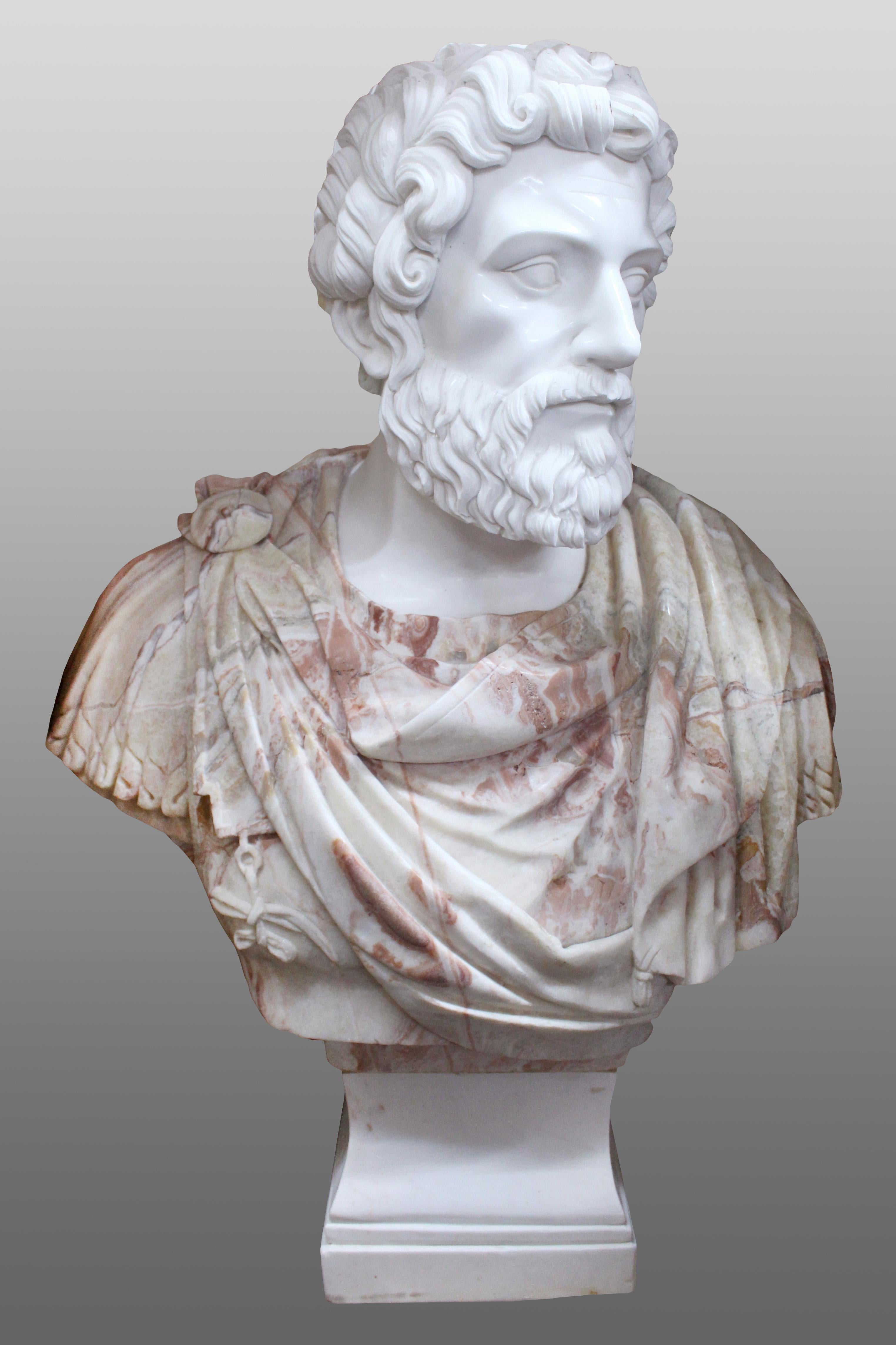Carved white & rouge marble bust of Marcus Aurelius

Measures: Width 74 cm 29 in
Depth 32 cm 12 1/2 in
Height 95 cm 37 1/2 in
Base 25 x 25 cm 10 x 10 in.
 

Period late 20th century

Composition the whole made from carved marble in three