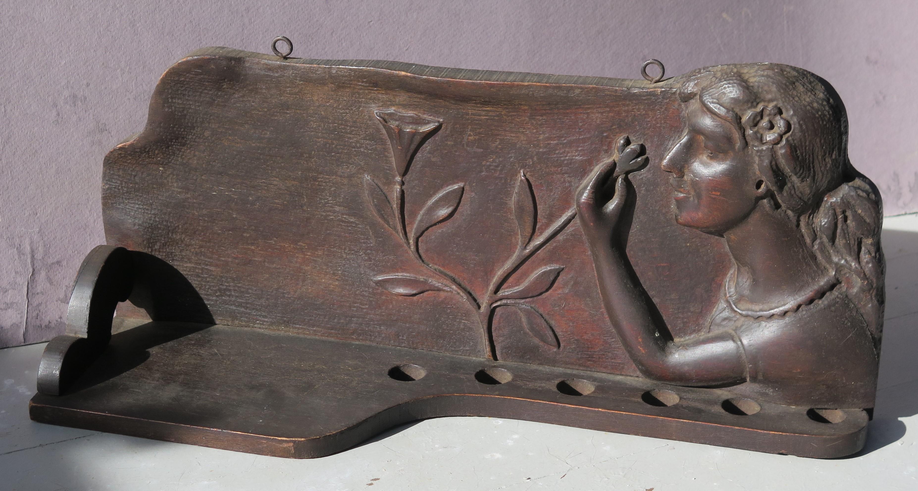 Folk Art Carved Woman with Flowers Pipe Shelf For Sale