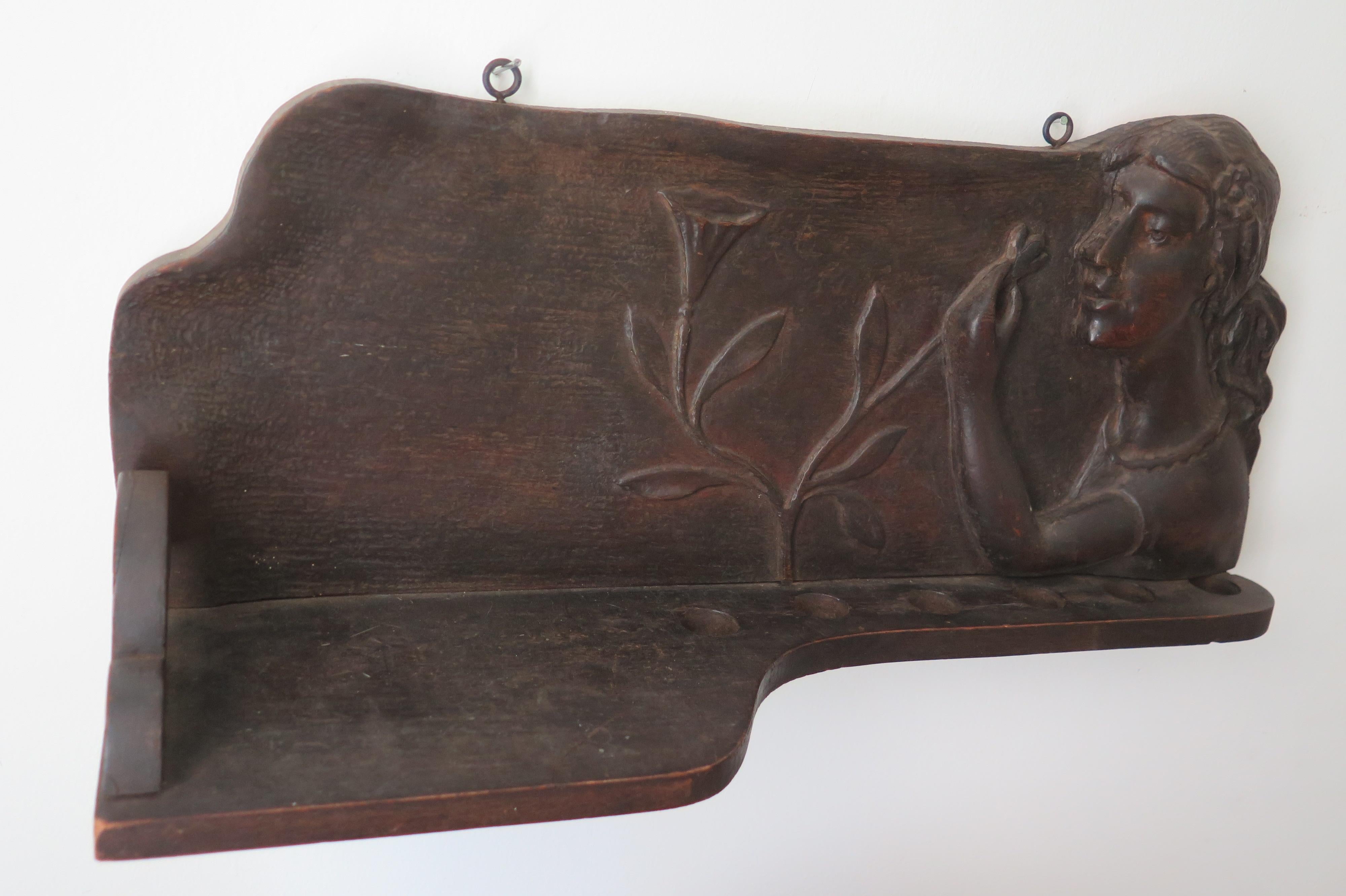 Wood Carved Woman with Flowers Pipe Shelf For Sale