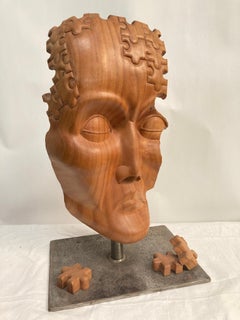 Carved wood abstract head sculpture