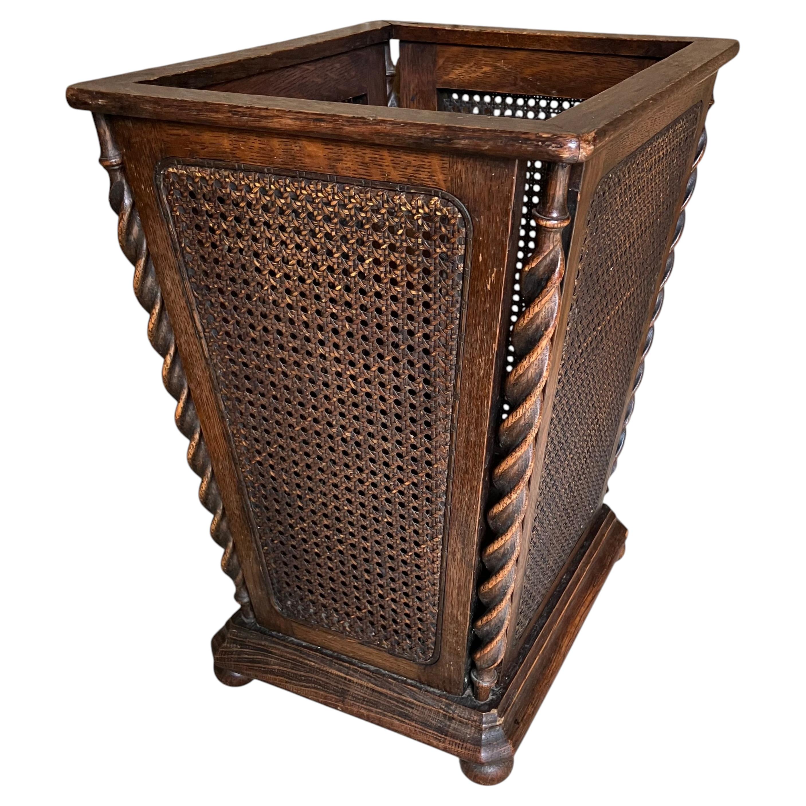 Carved Wood and Caned Wastebasket