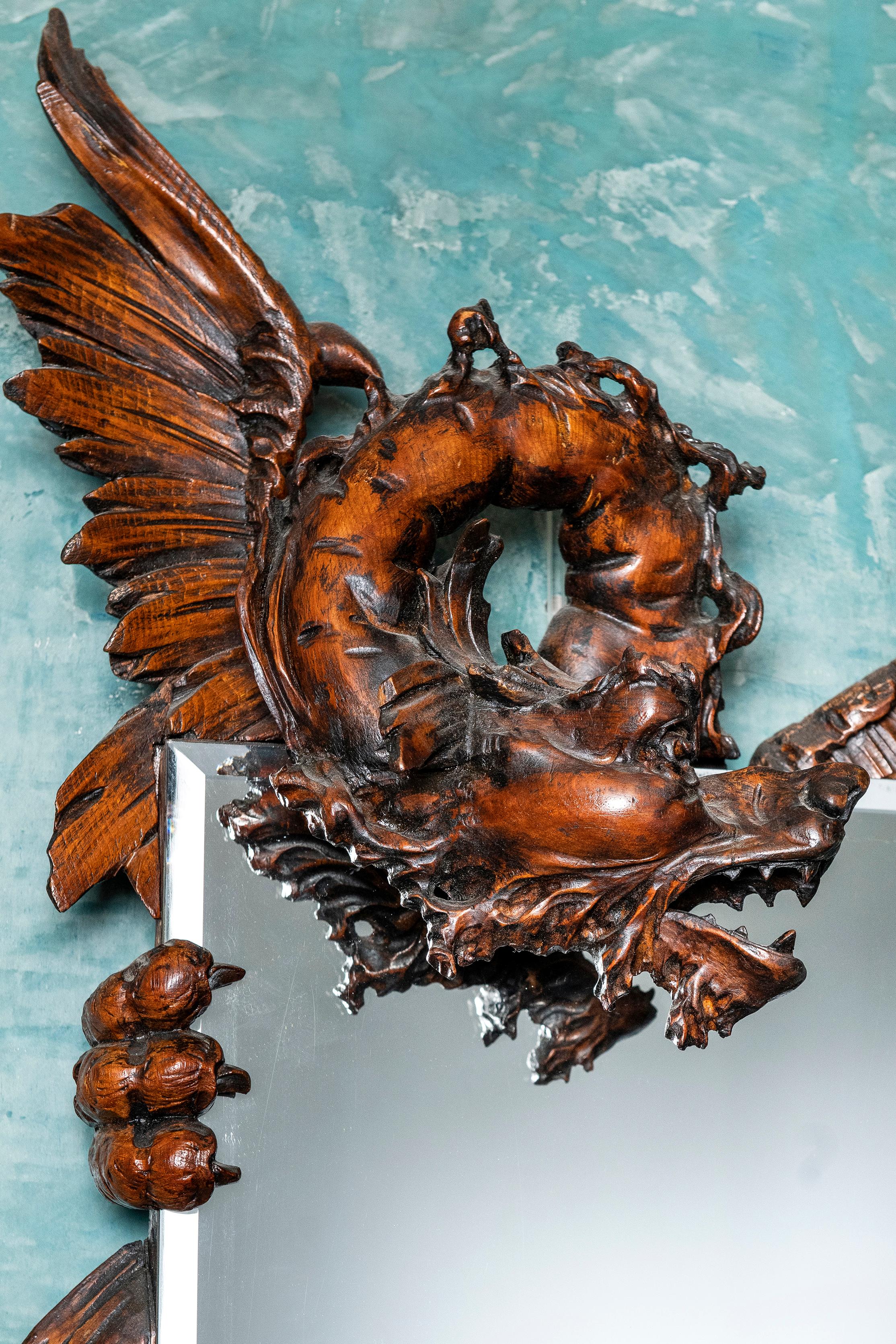 Carved wood and crystal mirror. France, late 19th century.
 