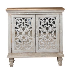 Carved Wood and Painted Teak Cabinet with Mirrored Back