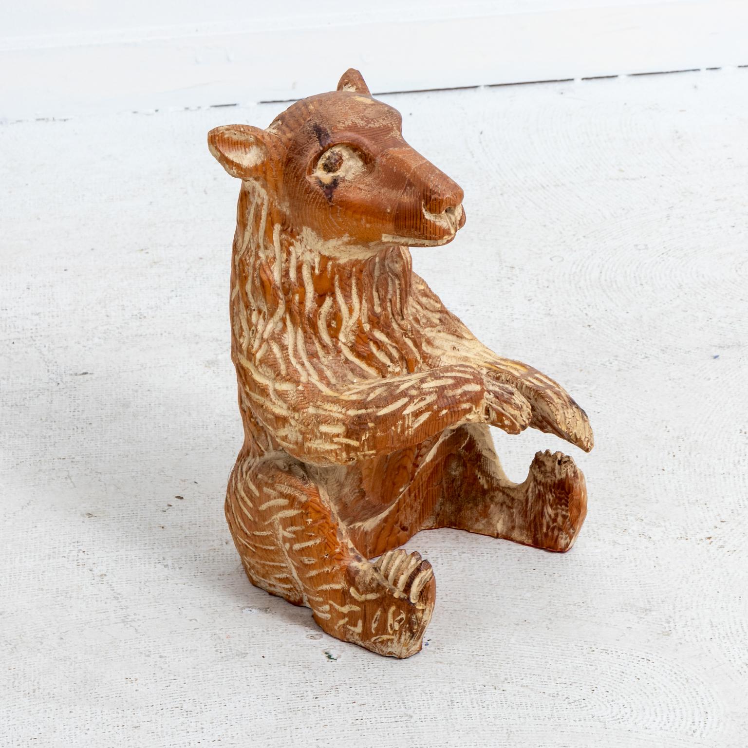 Vintage carved wood bear sculpture by Sarreid. Please note of wear consistent with age including an intentionally distressed finish.