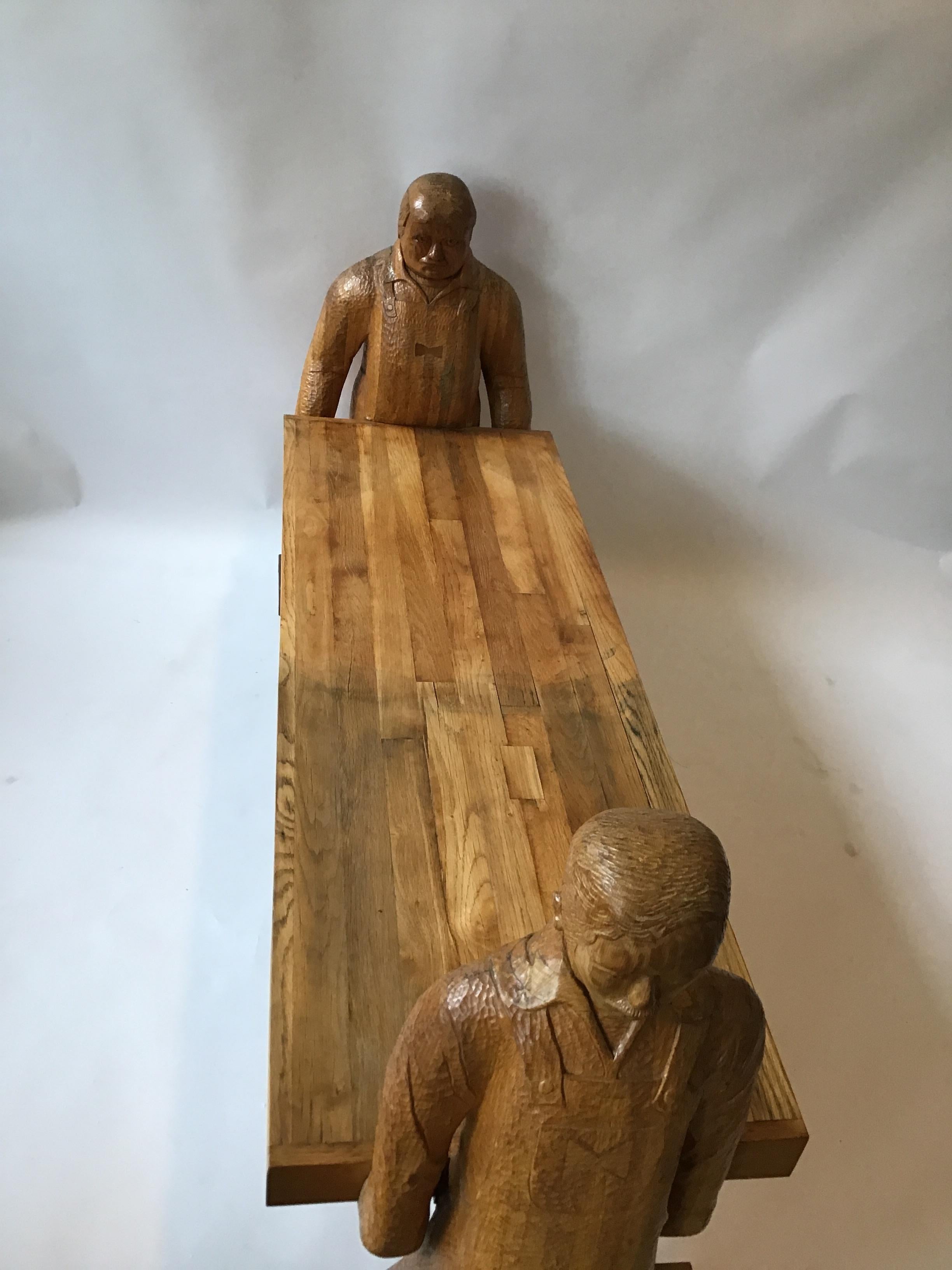Carved Wood Bench or Table of Two Workers Moving a Piece of Wood 5