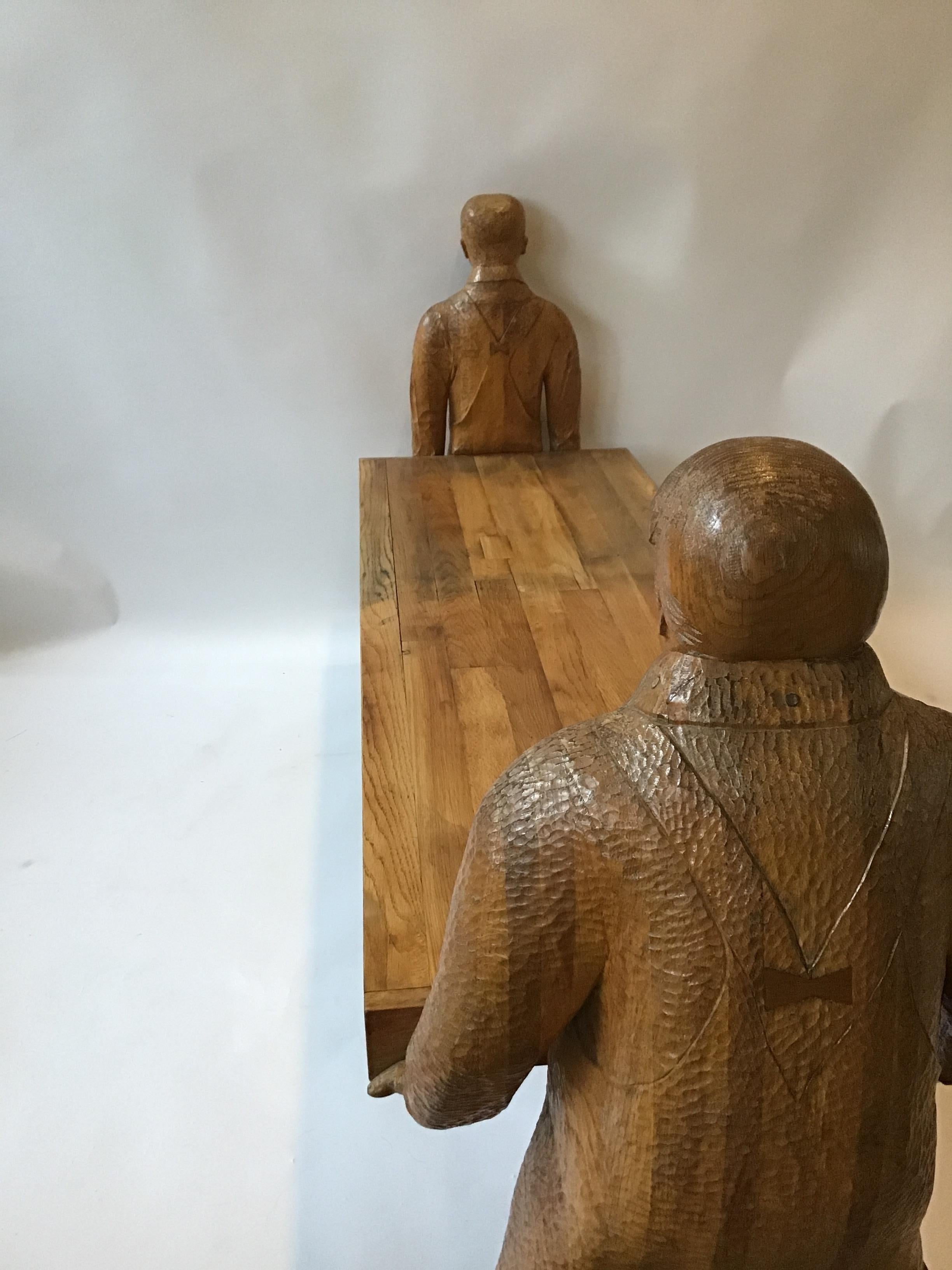 Carved Wood Bench or Table of Two Workers Moving a Piece of Wood 13