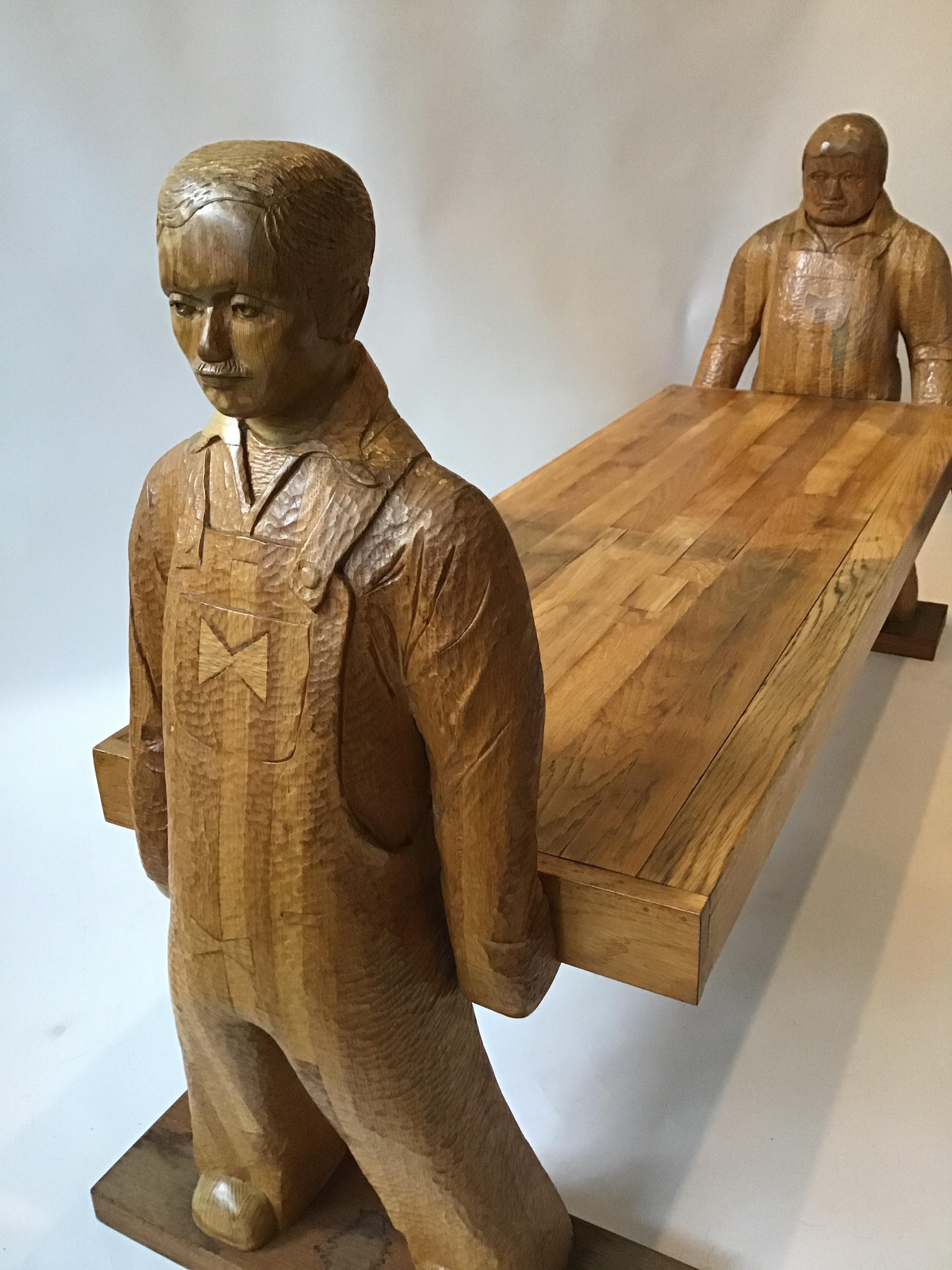 Carved Wood Bench or Table of Two Workers Moving a Piece of Wood 2