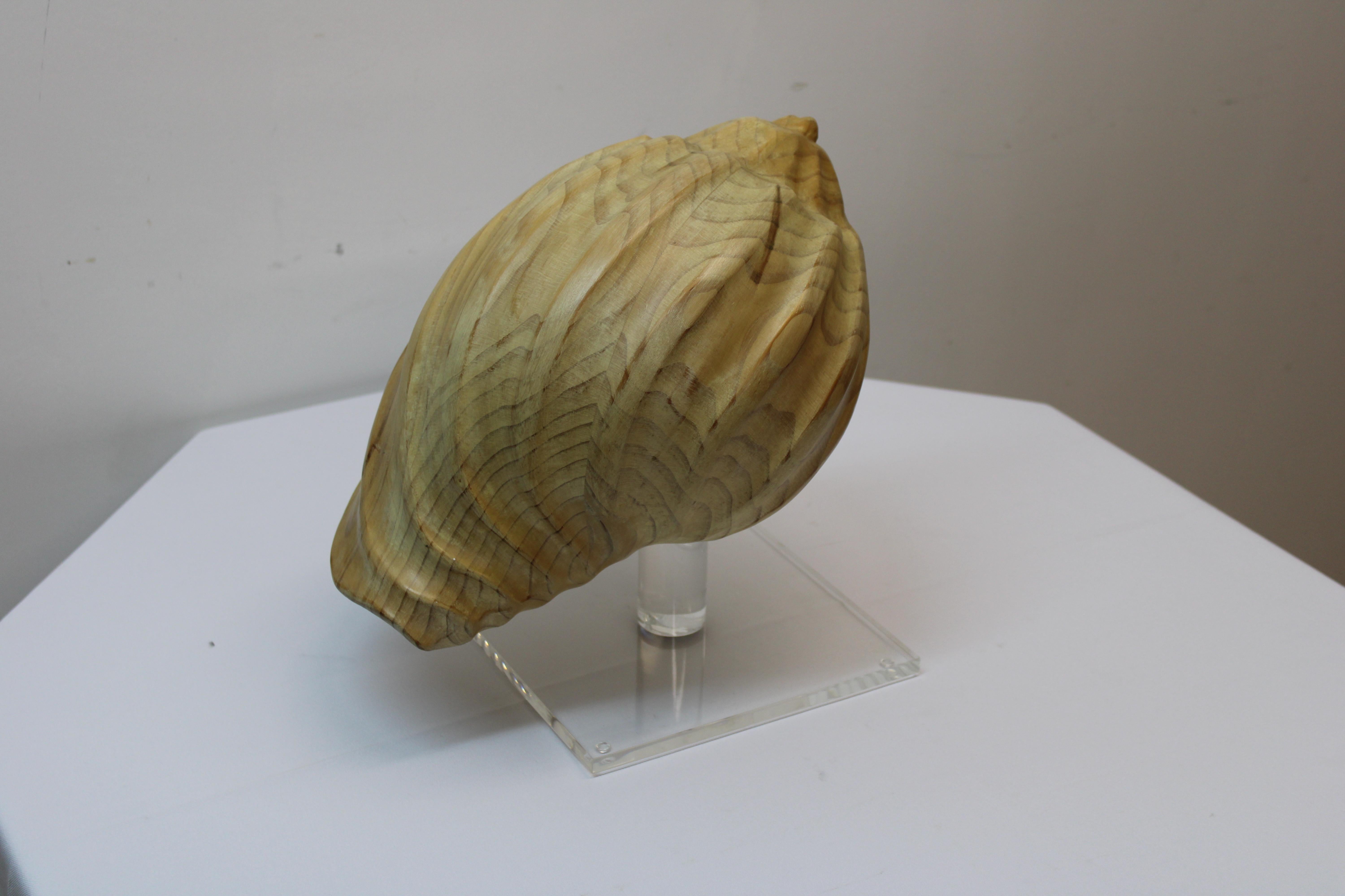 Carved Wood Conch Shell on Lucite Base 1