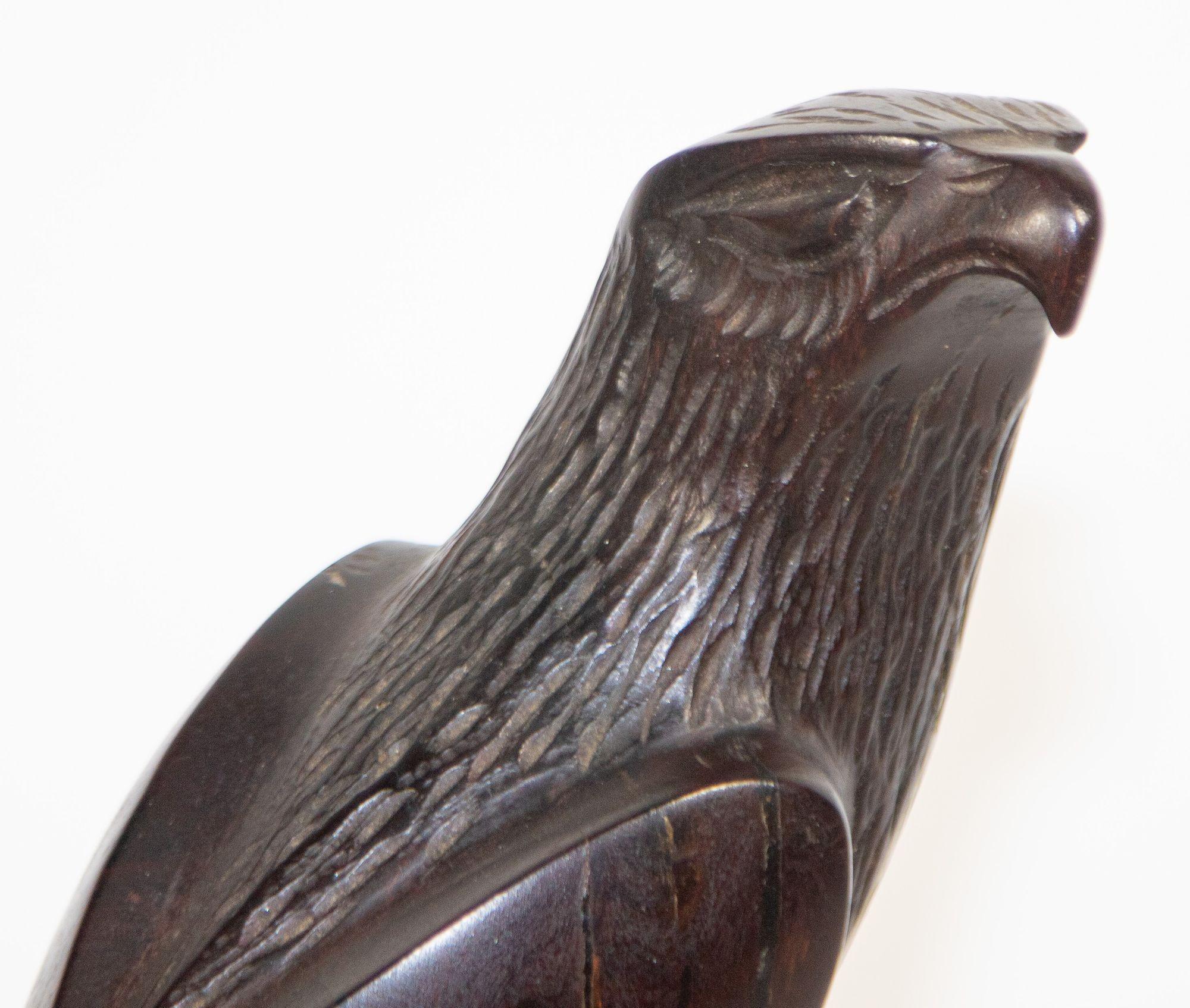 Handmade carved wood Falcon sculpture 1960s.
Vintage Seri Ironwood Animal Hand-Carved Sculpture of a American Eagle or Falcon.
Vintage Hand carved walnut wooden beautiful design decorative bird falcon sculpture.
Carved wood figure of an Eagle
