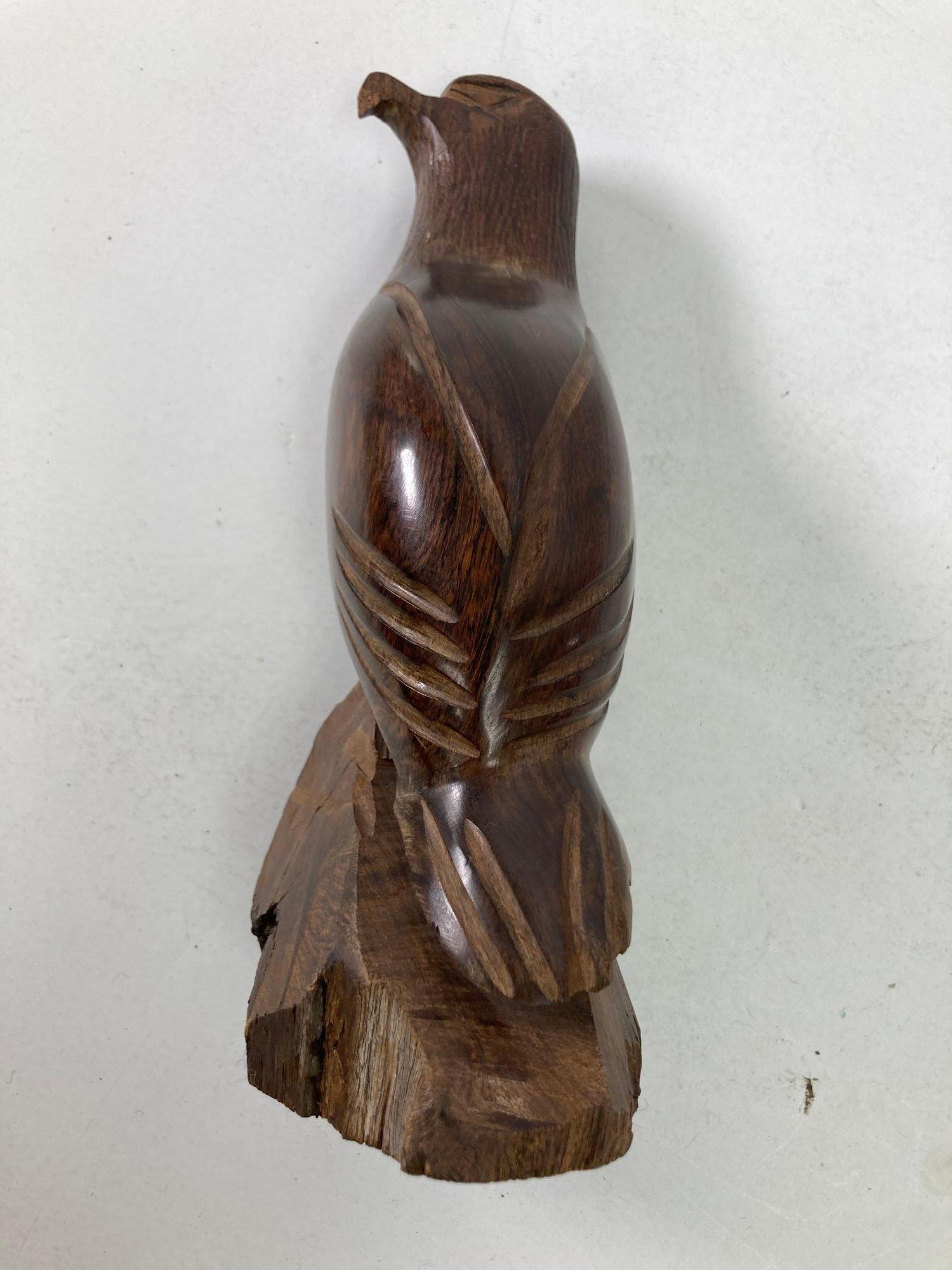 Handmade carved wood Falcon sculpture 1960s.
Vintage Seri Ironwood Animal Hand-Carved Sculpture of a American Eagle or Falcon.
Vintage Hand carved walnut wooden beautiful design decorative bird falcon sculpture.
Carved wood figure of an Eagle