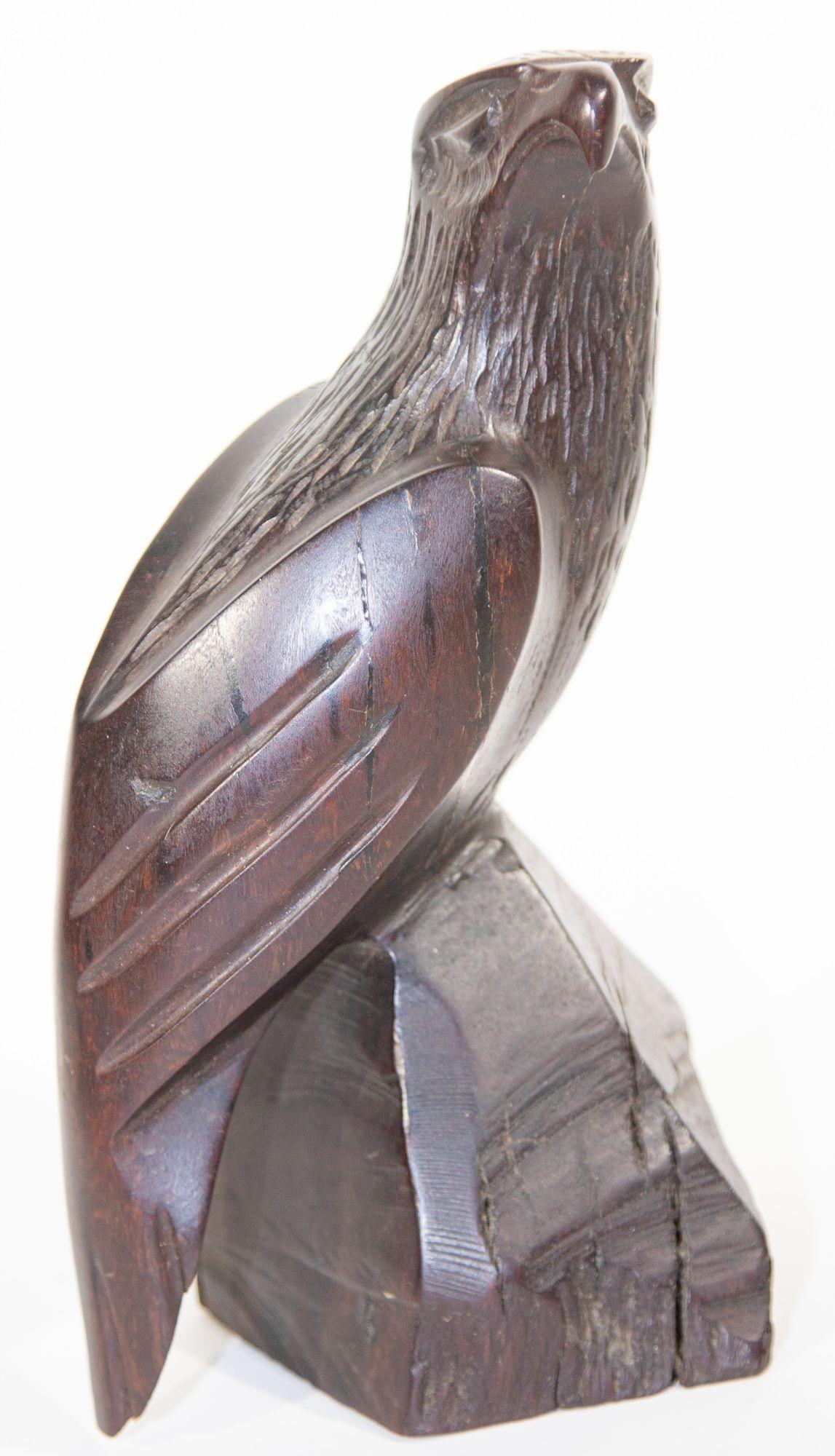 wooden falcon sculpture