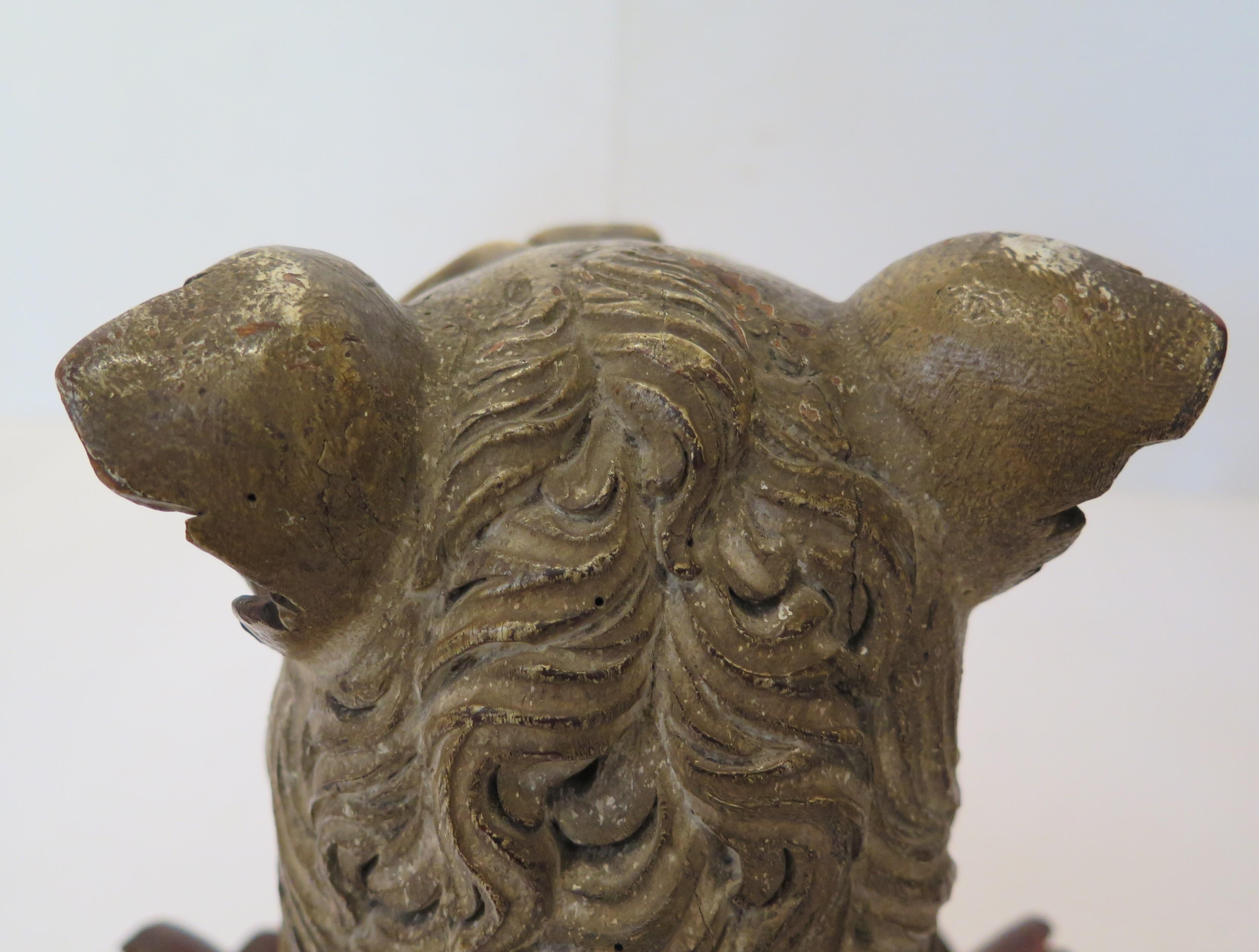 Carved Wood Family Crests ''Out of a Ducal Coronet, Or, a Bear's Head Ppr.