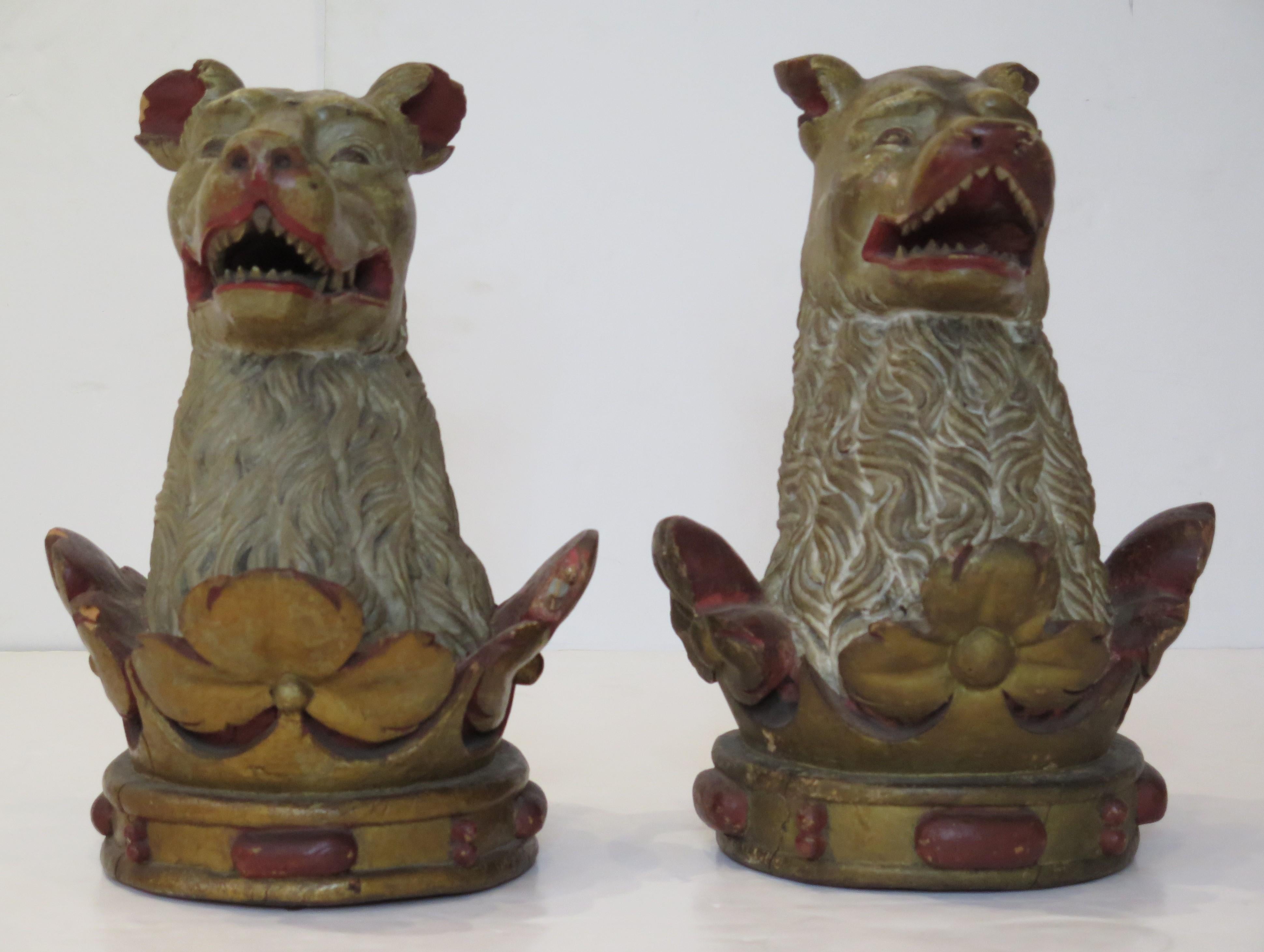 carved, painted, and gilded wood armorial crests / carvings, great faces, lots of personality, great teeth

''out of a ducal coronet or, a bear's head, ppr.''

perhaps having to do with the Family Brereton

(we believe them to be bears, not wolves,