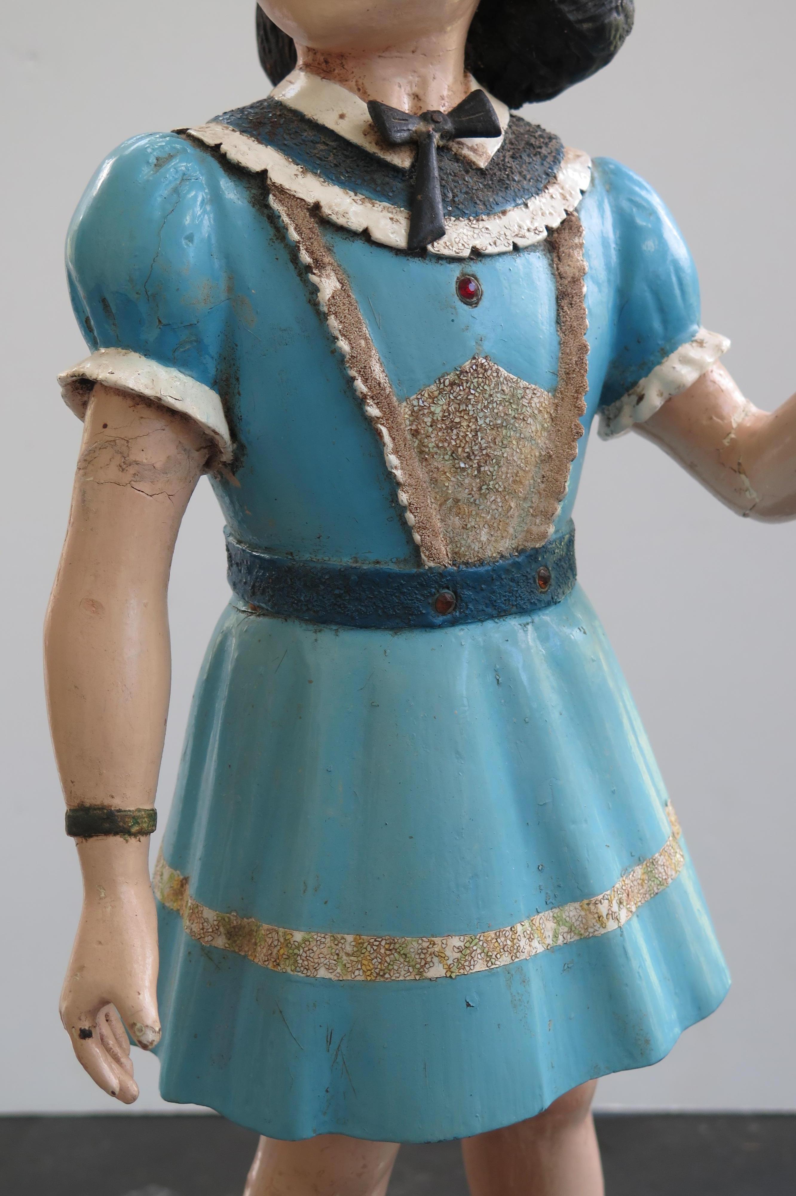 Mid-20th Century Carved Wood Folk Art Girl For Sale