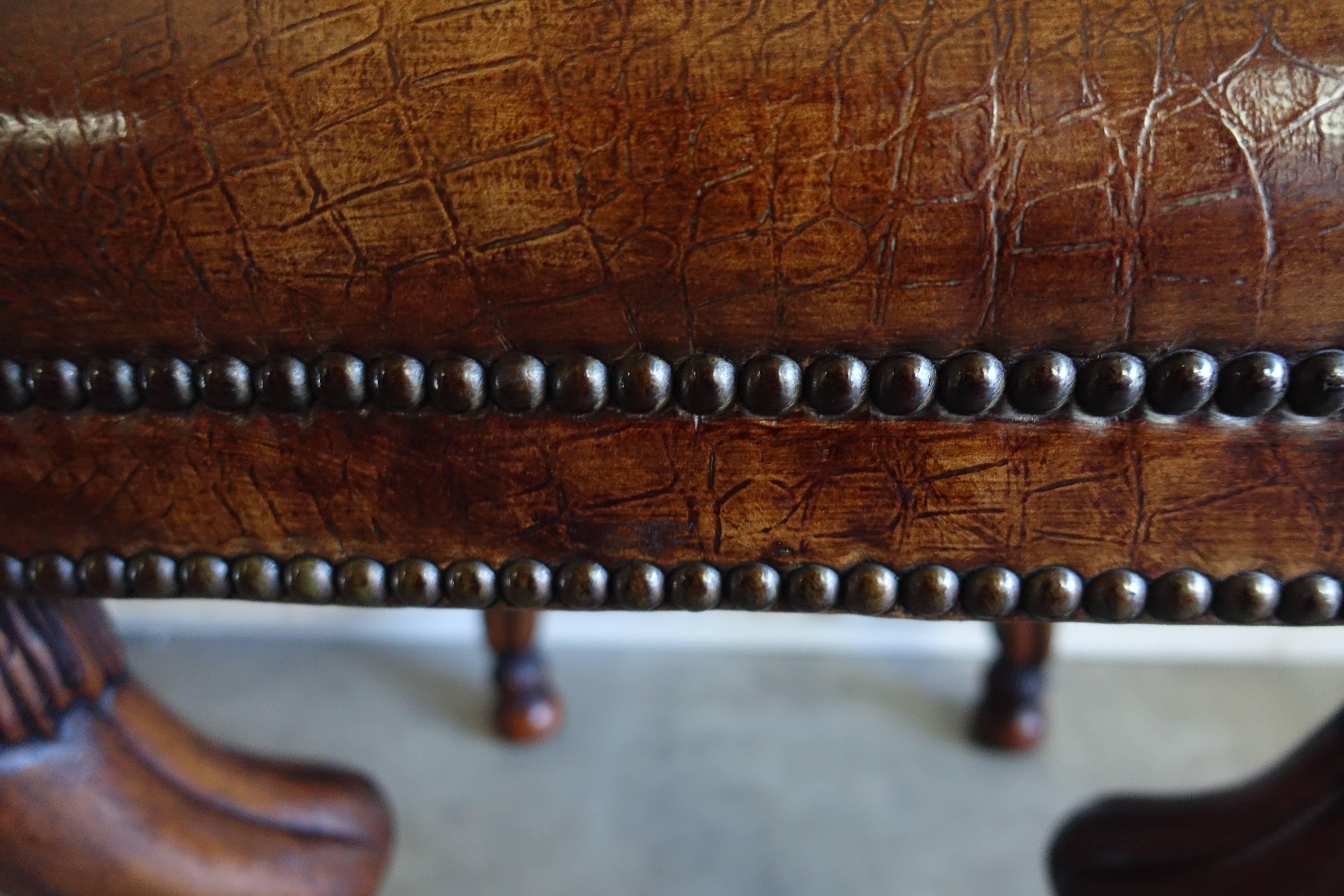 Carved Wood Gazelle Embossed Leather Benches, Pair In Distressed Condition In Los Angeles, CA