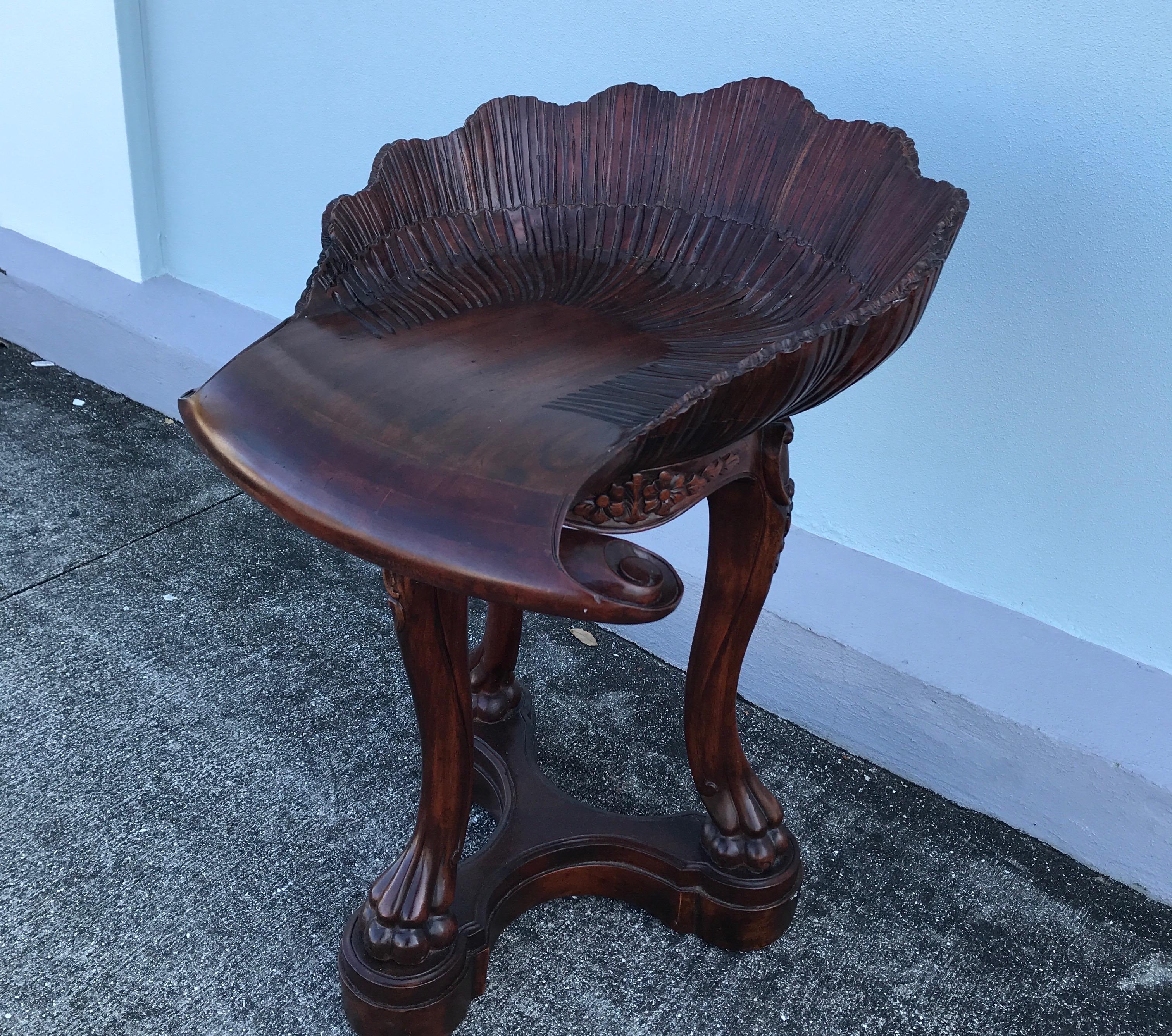 Grotto style carved wood shell stool.