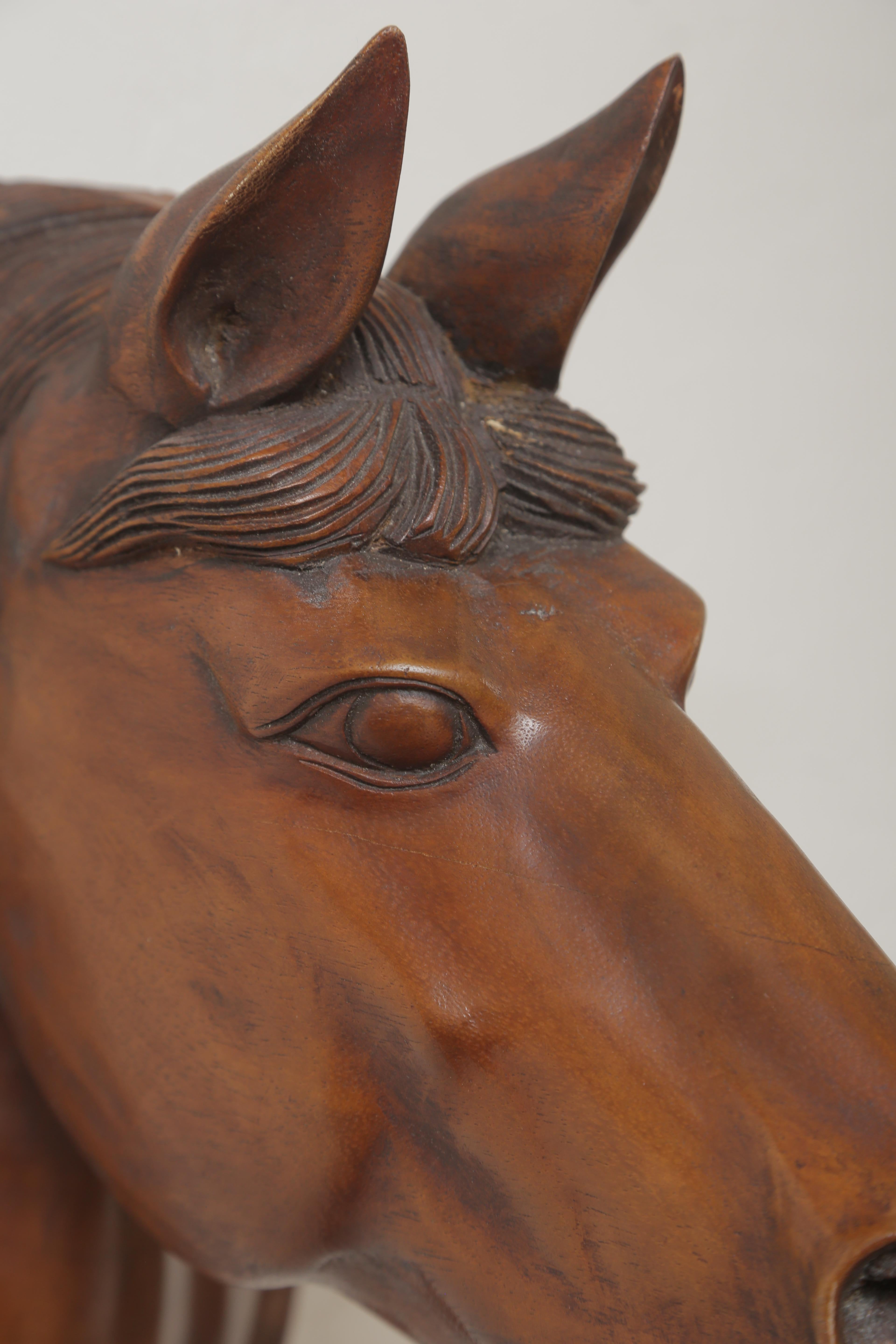 wood carved horse head