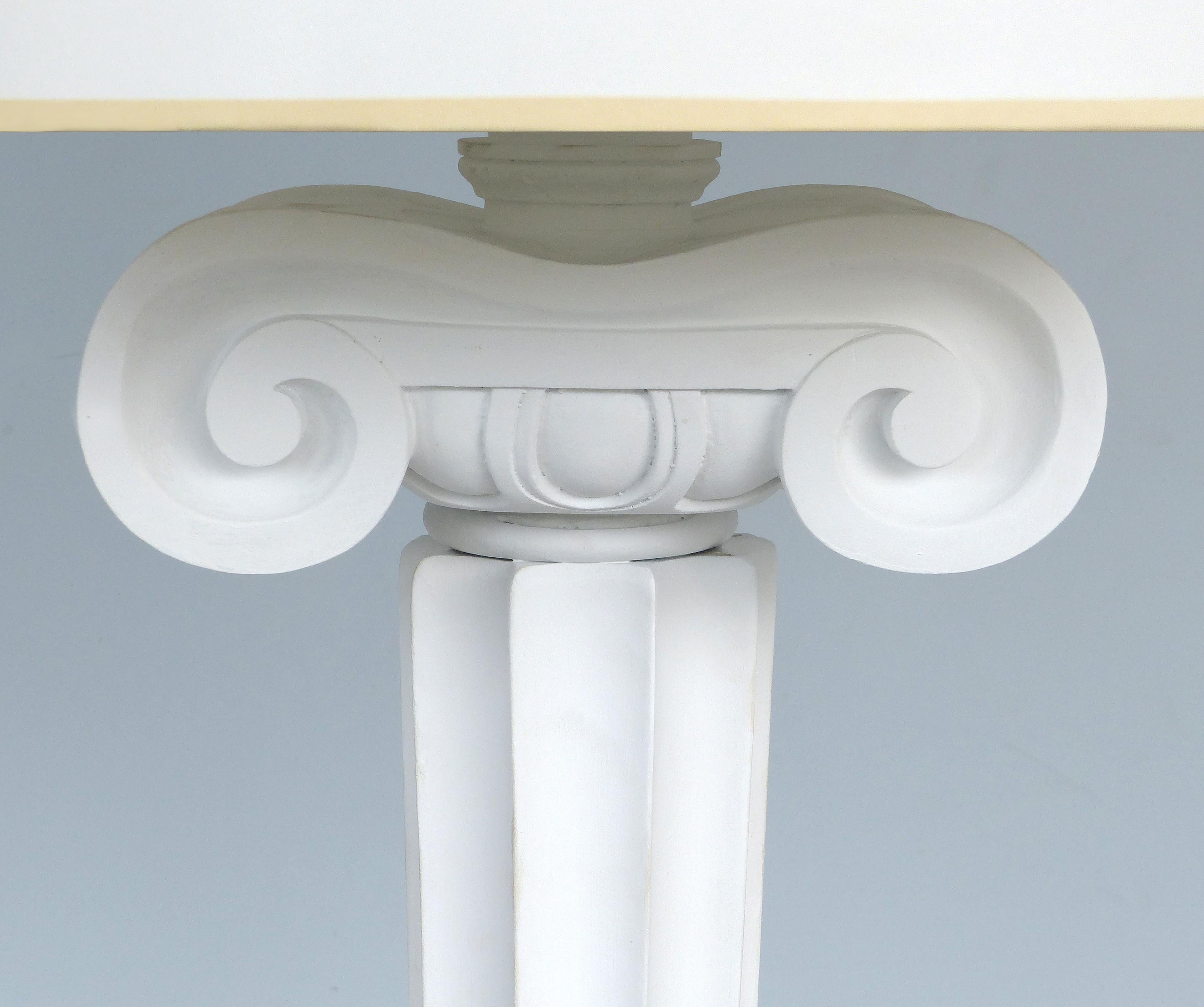 Carved Wood Ionic Column Floor Lamps from the Eden Roc Hotel in Miami Beach

Offered for sale is a pair of carved wood ionic column floor lamps designed by Diamond & Baratta for the world famous Eden Roc Hotel on Miami Beach. The lamps are rewired