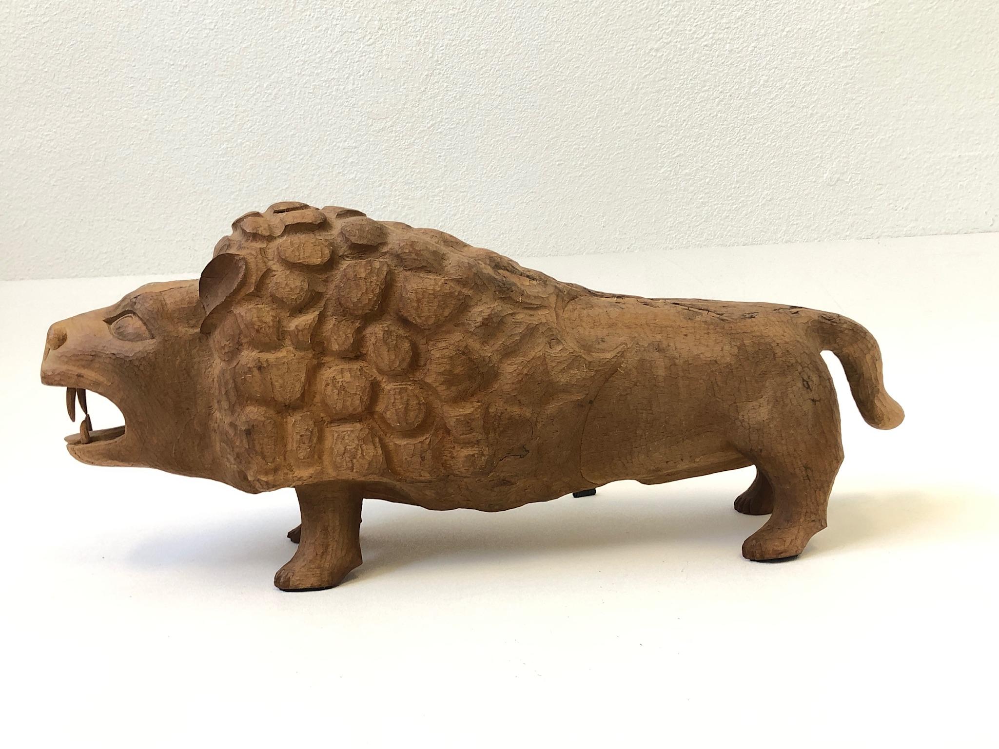 Hand-Carved Carved Wood Lion Sculpture in the Manner of Evelyn Ackerman For Sale