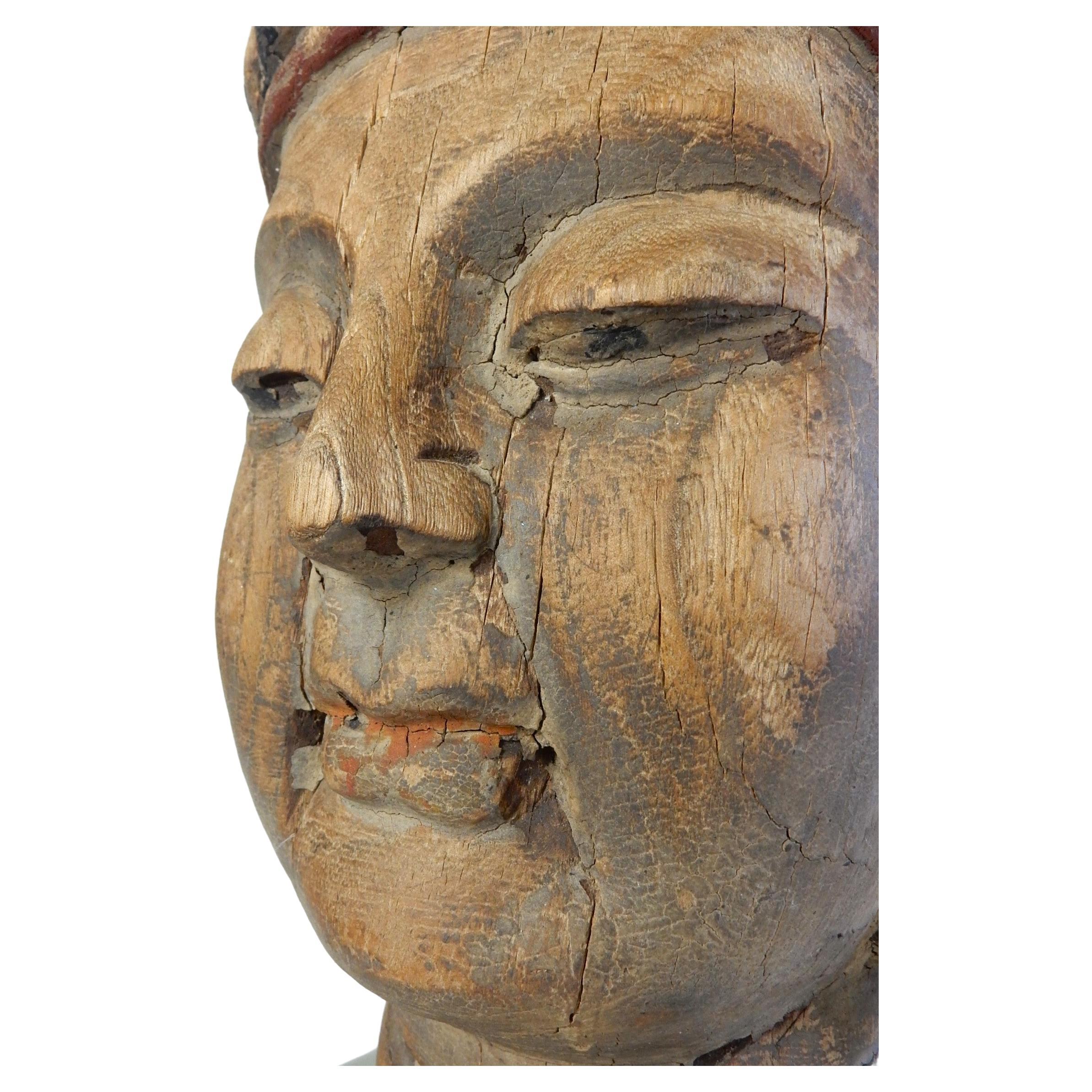 Exquisite hand carved head of Buddha.
We are not experts so we're guessing this pieces age. Could be much older.
Wonderful decoration piece sat on a plinth of old green sidewalk glass.
Stands 20in tall X 7-1/2in X 8in.