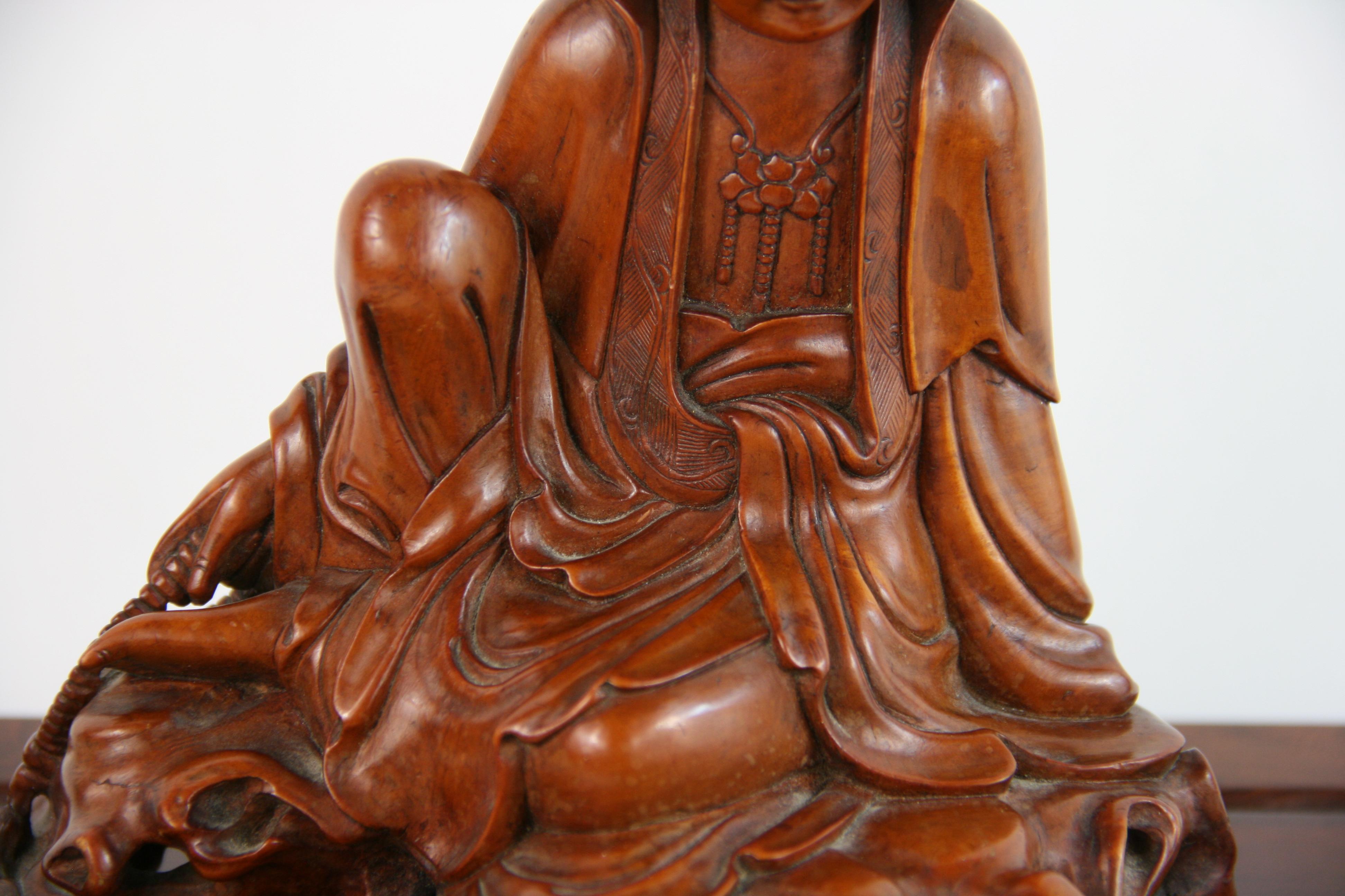 Hardwood Carved Boxwood Figure of Guangin on Wood Base, 19th Century