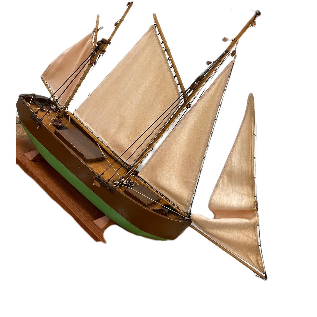 C. 20th century

Carved wood sailboat.