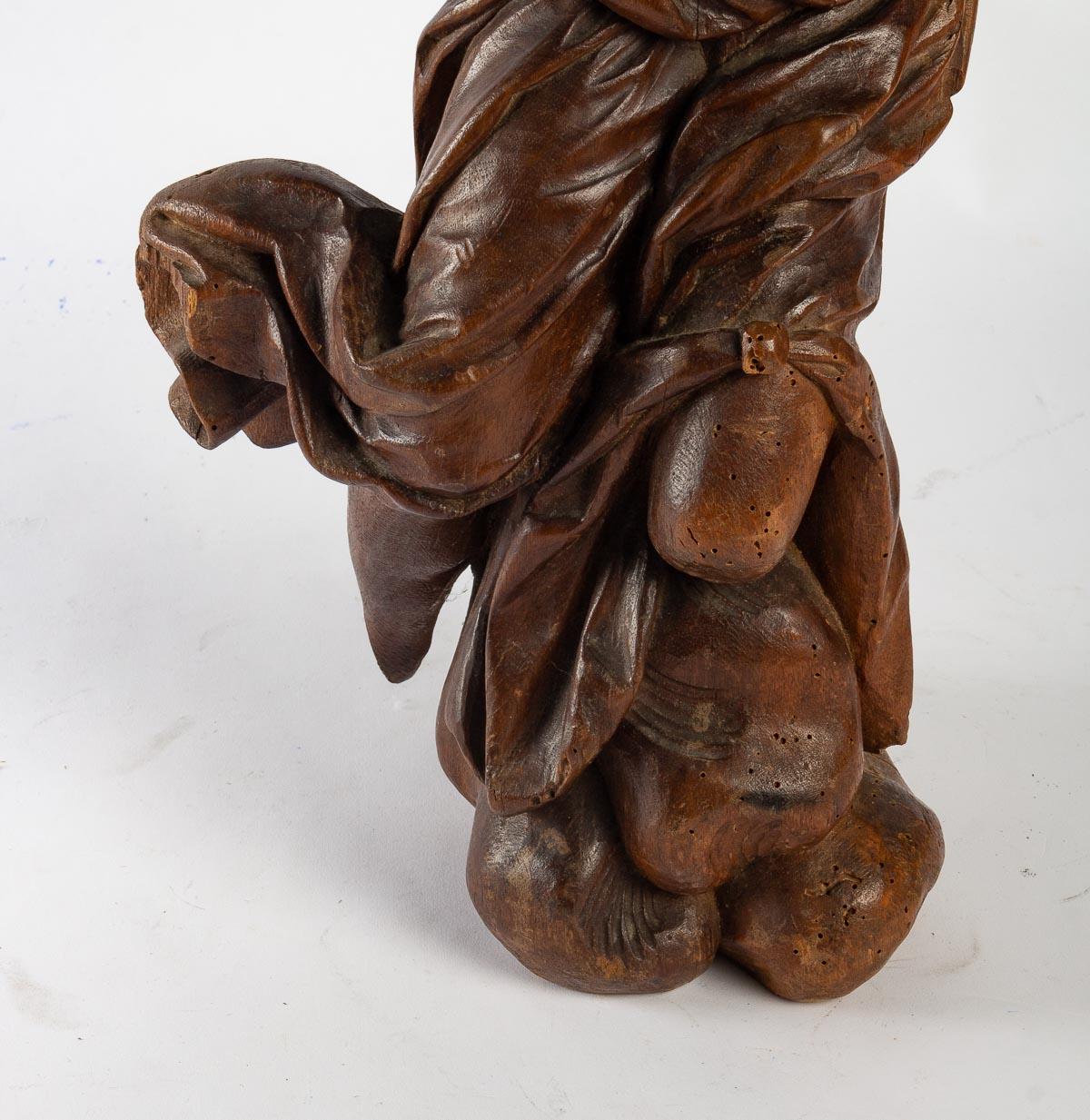 Carved wood sculpture from the 19th century.
Measures: H: 54 cm, W: 26 cm, D: 18 cm.