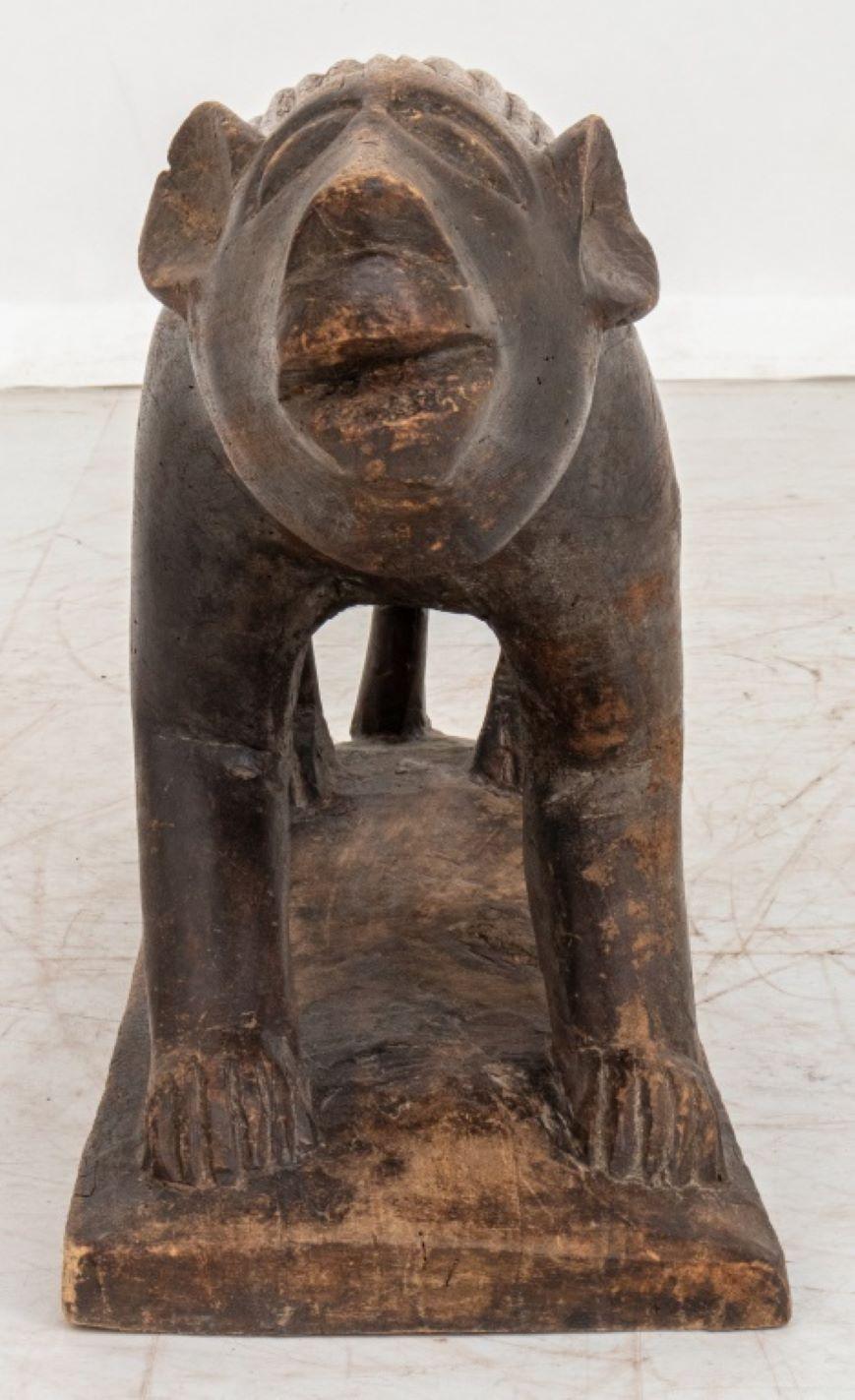 Carved Wood Sculpture of a Lion For Sale at 1stDibs