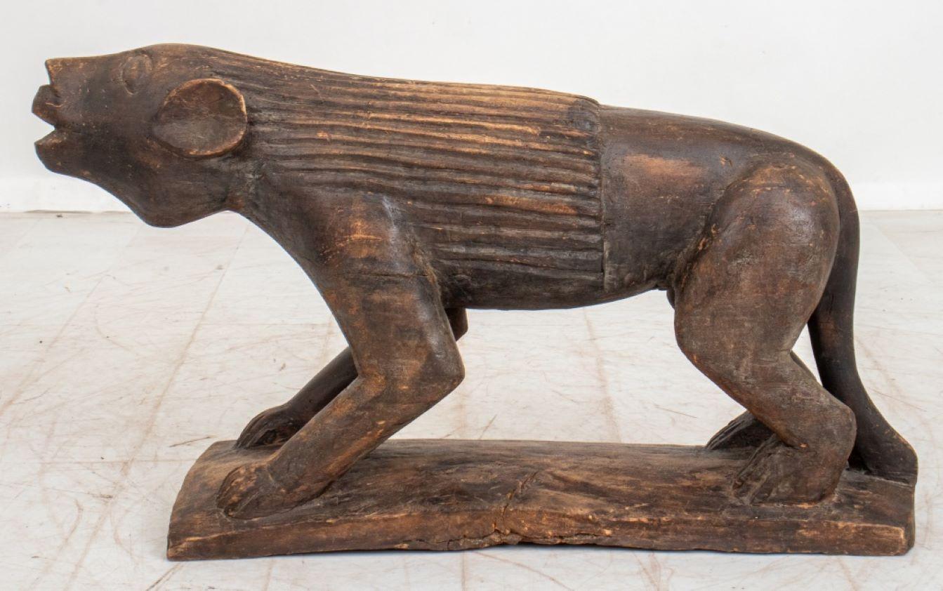 Carved Wood Sculpture of a Lion For Sale at 1stDibs