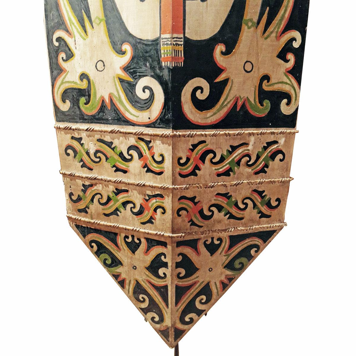Tribal Carved Wood Shield from Borneo, Mid-20th Century