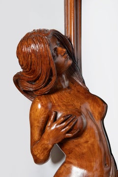 Miroir mural en bois sculpté, période Art nouveau France, début du XXe siècle.