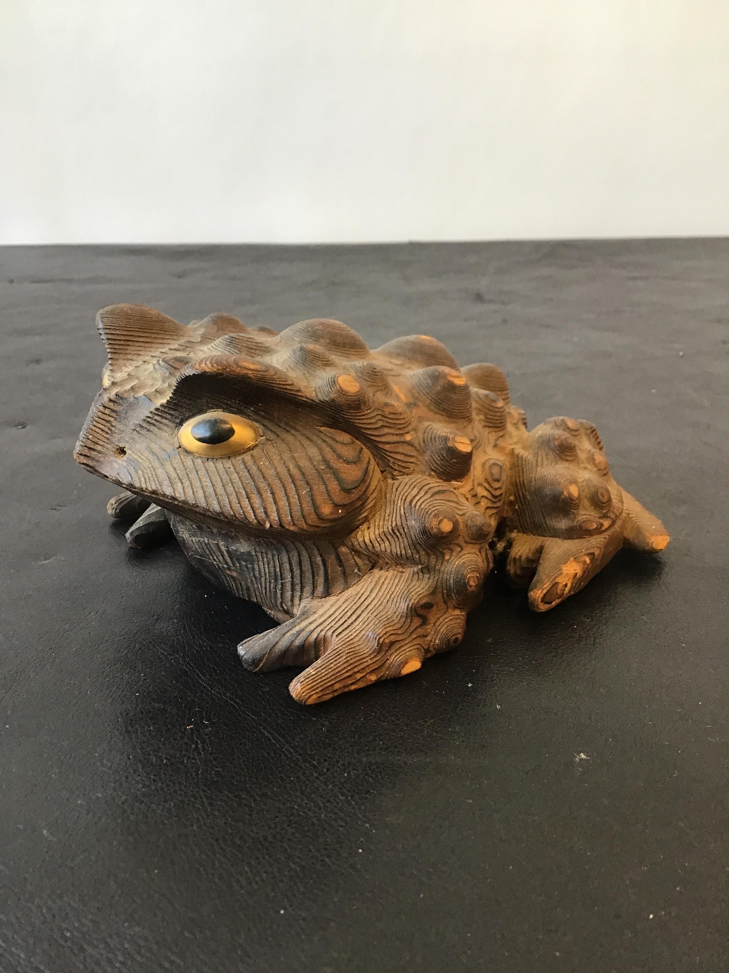 1960s Hand carved wood frog from an exotic wood where the bumps in the wood appear to be warts on a frog.