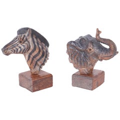 Carved Wood Zebra and Elephant Heads