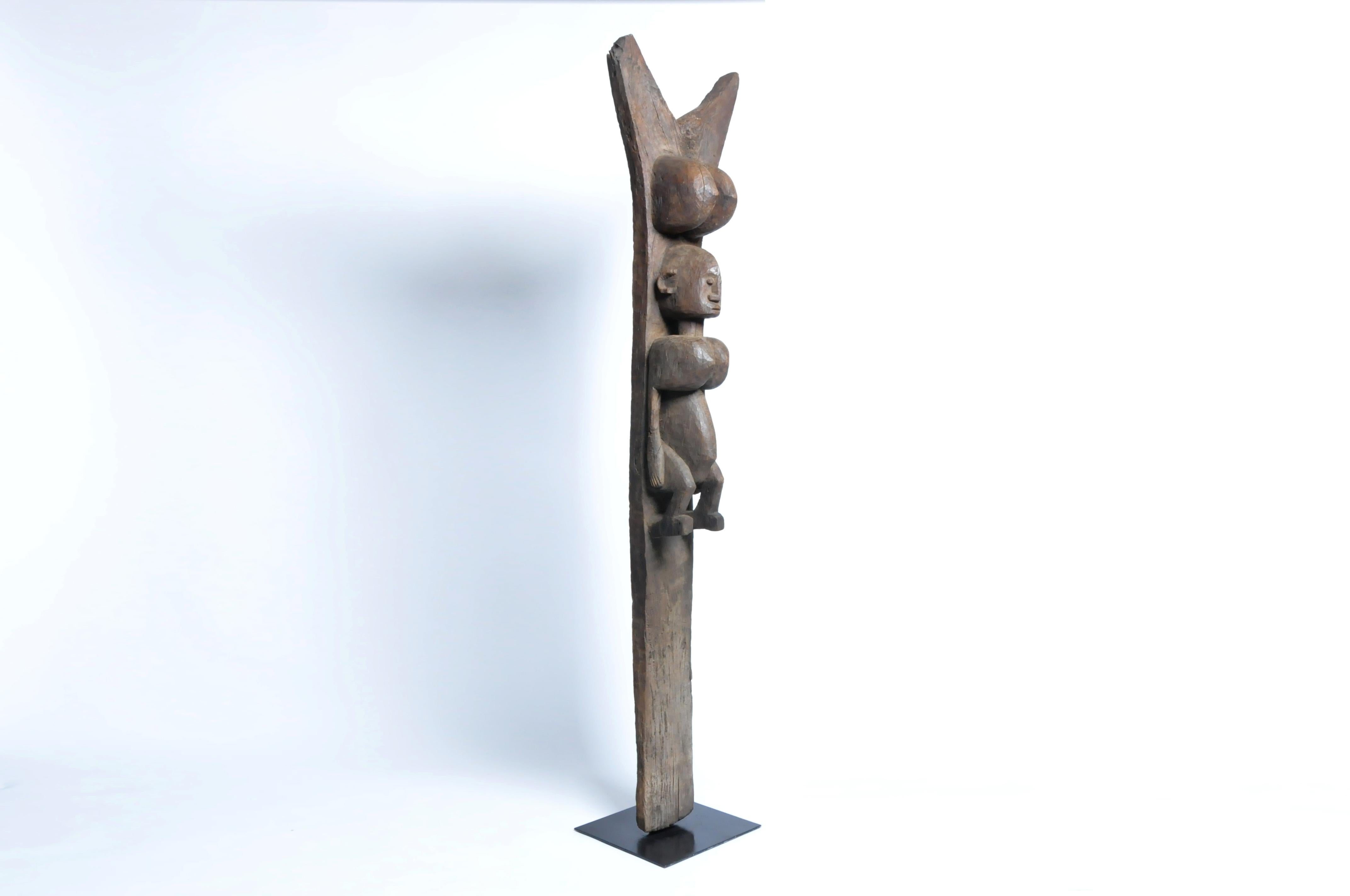 Bamana tribe art is known for masks, textiles and architectural elements. This Y-shaped post supported a heavy roof timber and acted as a welcoming symbol. Bamana and Dogon building posts are very similar but fewer Bamana pieces remain. This post