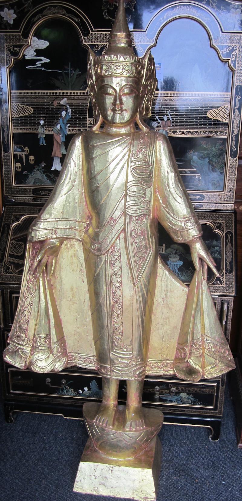 Carved wooden Buddha statue, 
Measures: 89 x 31 x 178cm high.
Our eclectic stock crosses cultures, continents, styles and famous names.