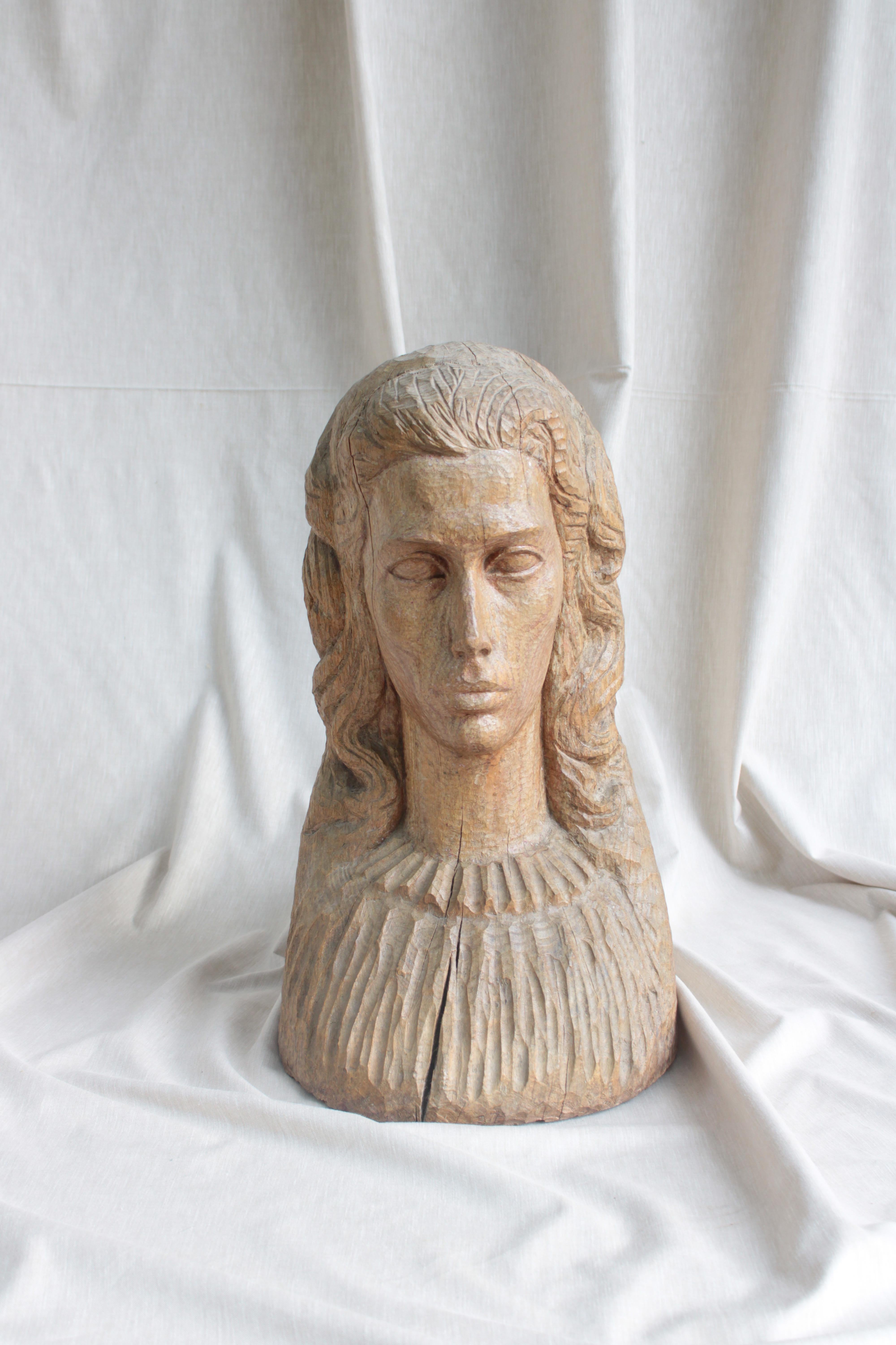 Carved wooden bust of a woman. Portugal 1930s.