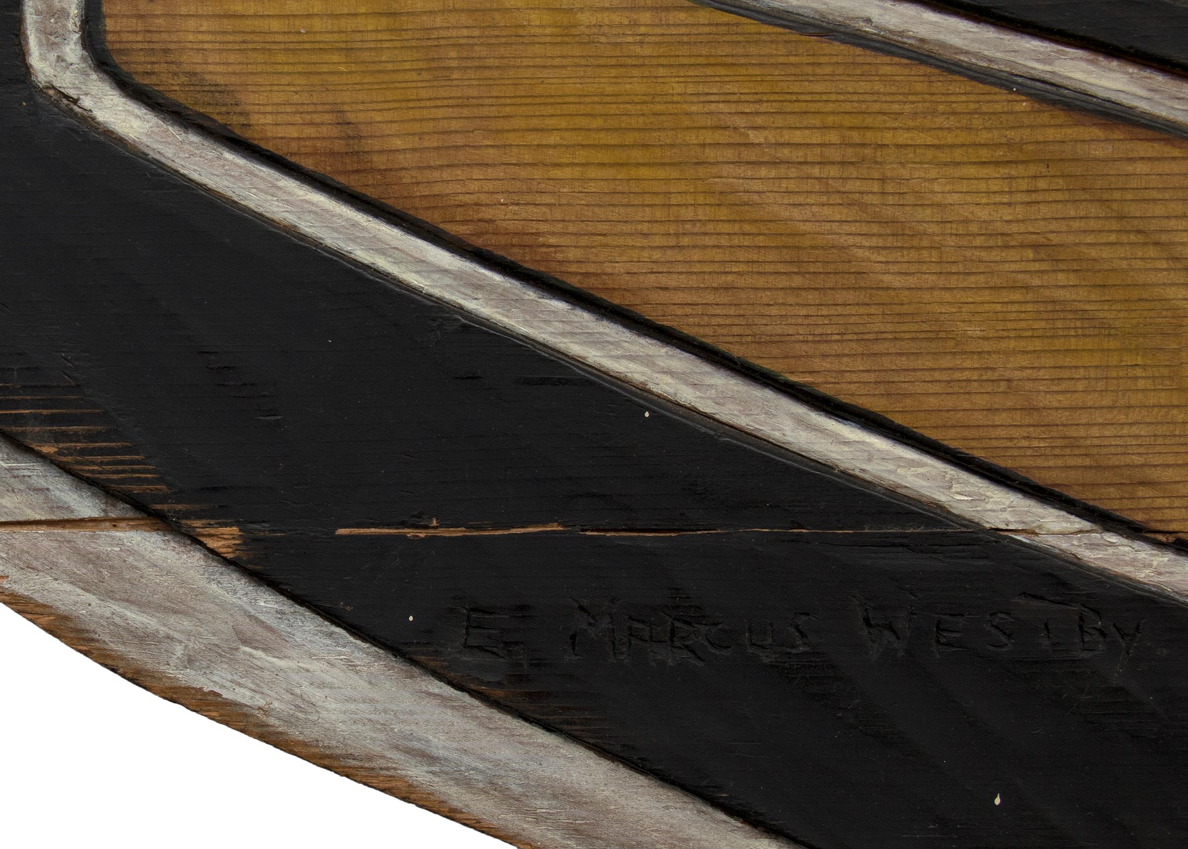 Panneau de chilkat en bois sculpté et peint, fabriqué au milieu du 20e siècle par E. Marcus Westby (1924-2010). 20e siècle par E. Marcus Westby (1924-2010). Présenté prêt à être accroché, les dimensions mesurent 31 ¾ x 66 ¼ x ¾ pouces.

La pièce