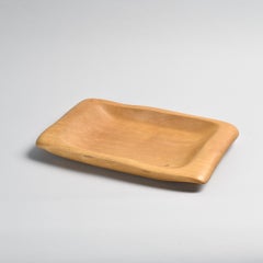 Plato de madera tallada de Alexander Noll, hacia 1950