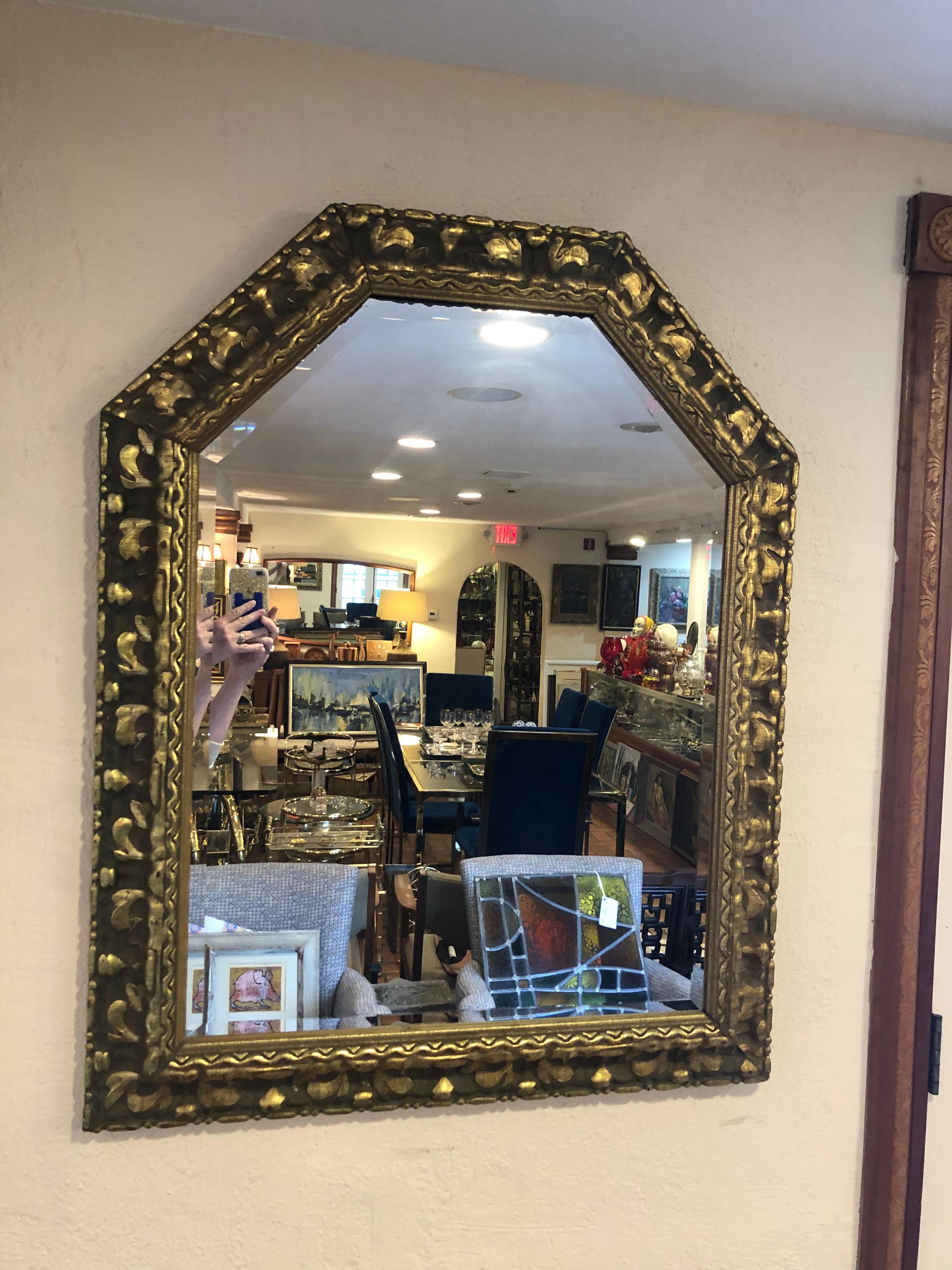 Carved wooden gold leaf mirror. Perfect for a bathroom or above a hallway table. Nice 3/4