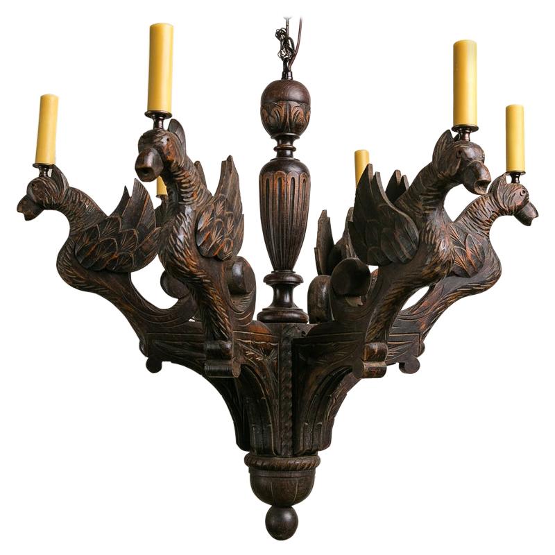Carved wooden Gothic chandelier with Gargoyles