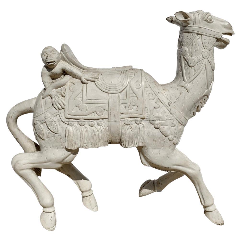 Chariot de manège camel en bois sculpté
