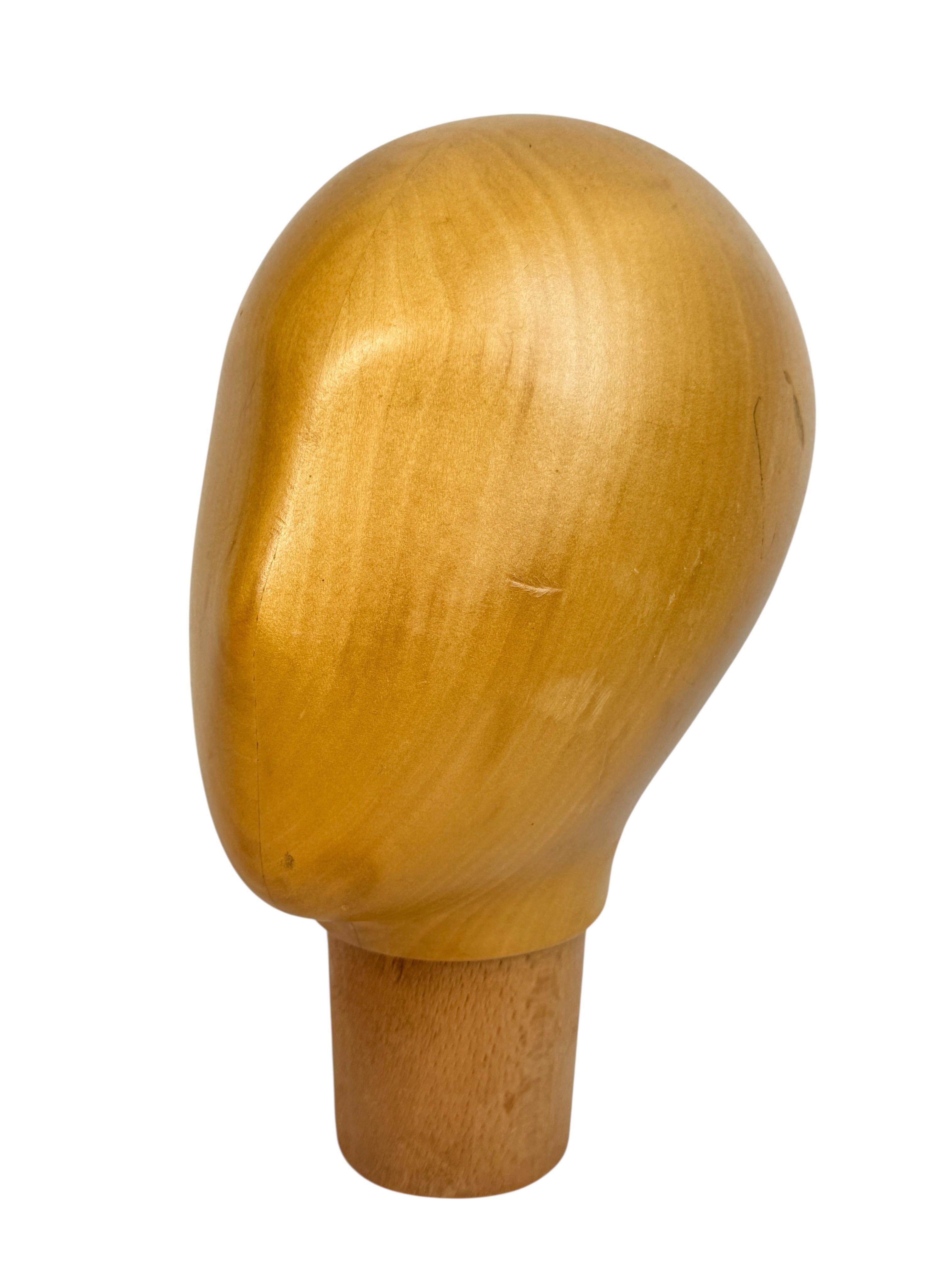 Adorable unique wood carved head. Italy, 1960s to 1970s. Ideal decoration item, used in the displaying and making of hats. Hand carved from wood. Nice display piece in any room. Found at an Estate Sale in Verona, Italy. Beautiful patina to the wood.