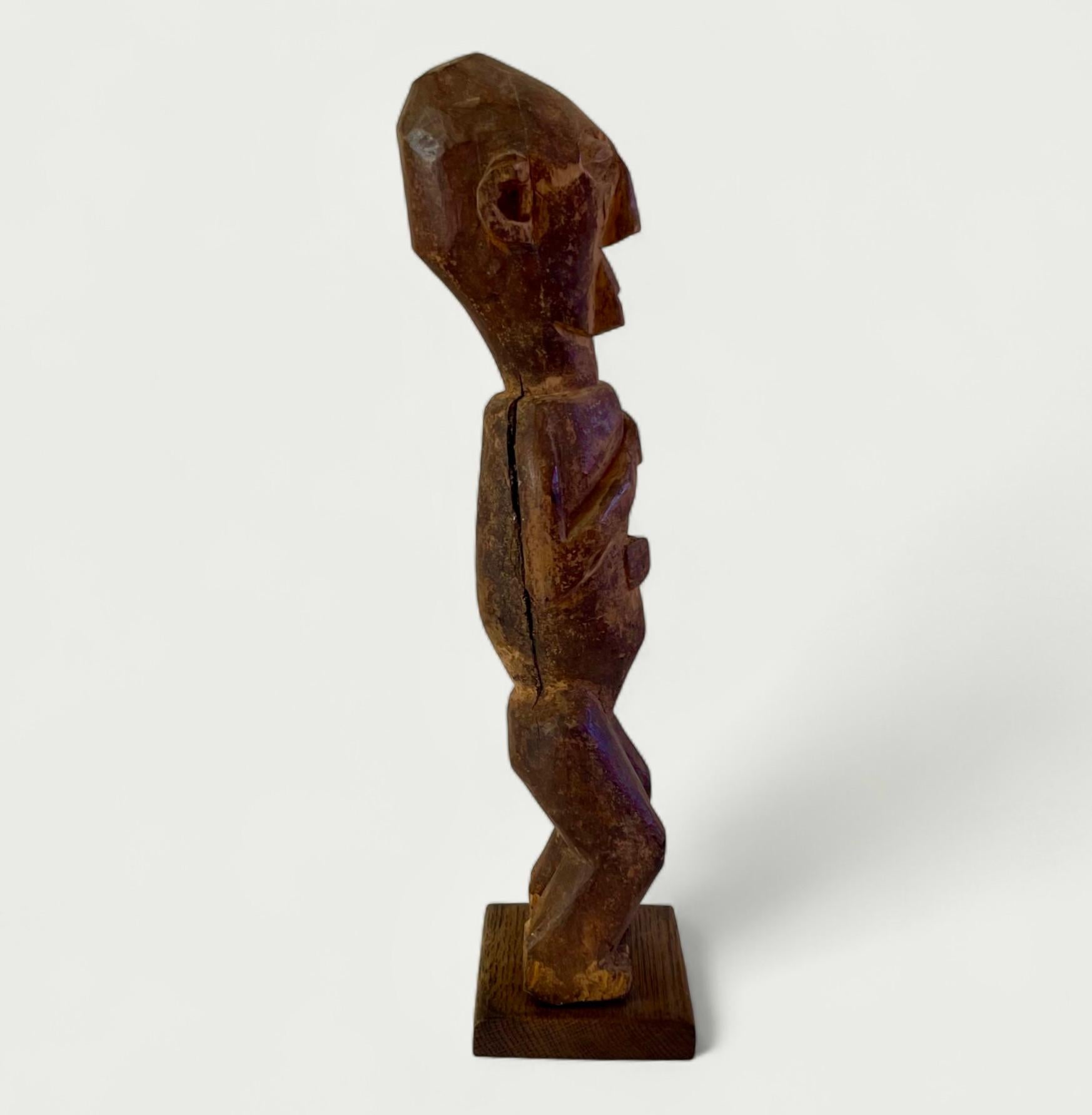 Tribal Carved Wooden 'Mpwuu' Statue, Yanzi People, Democratic Republic of Congo en vente