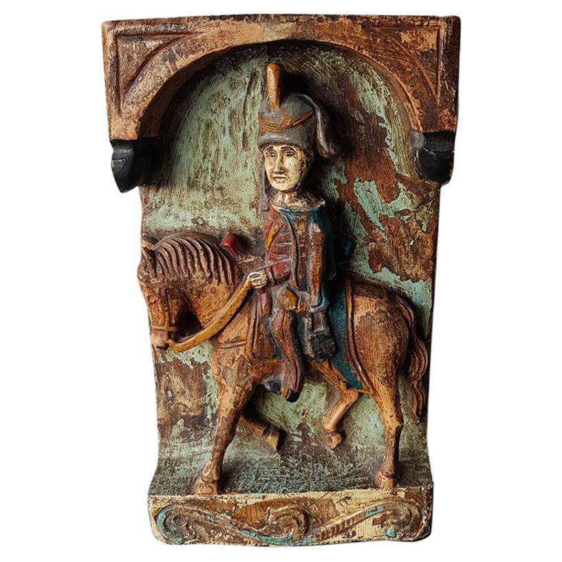 Carved Wooden Plaque of a Soldier on a Horse