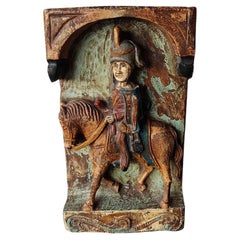 Carved Wooden Plaque of a Soldier on a Horse