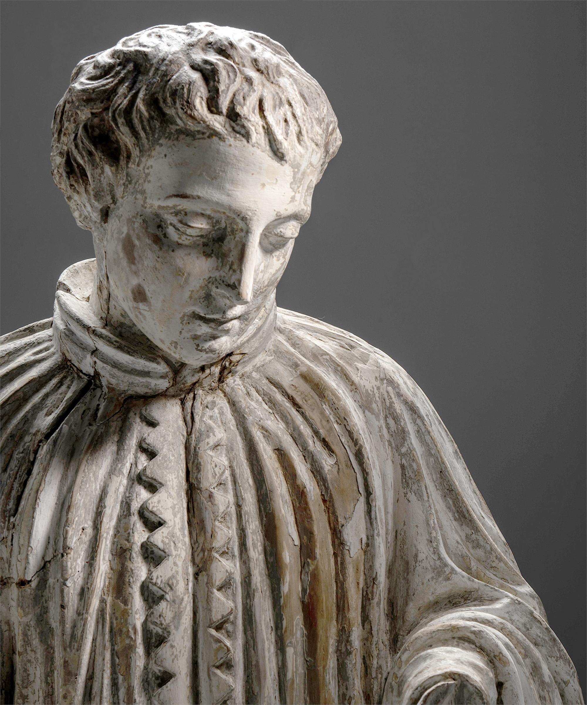 Carved Wooden Saint

England Circa 1790

Carved saint draped in a toga with foot resting on crown.