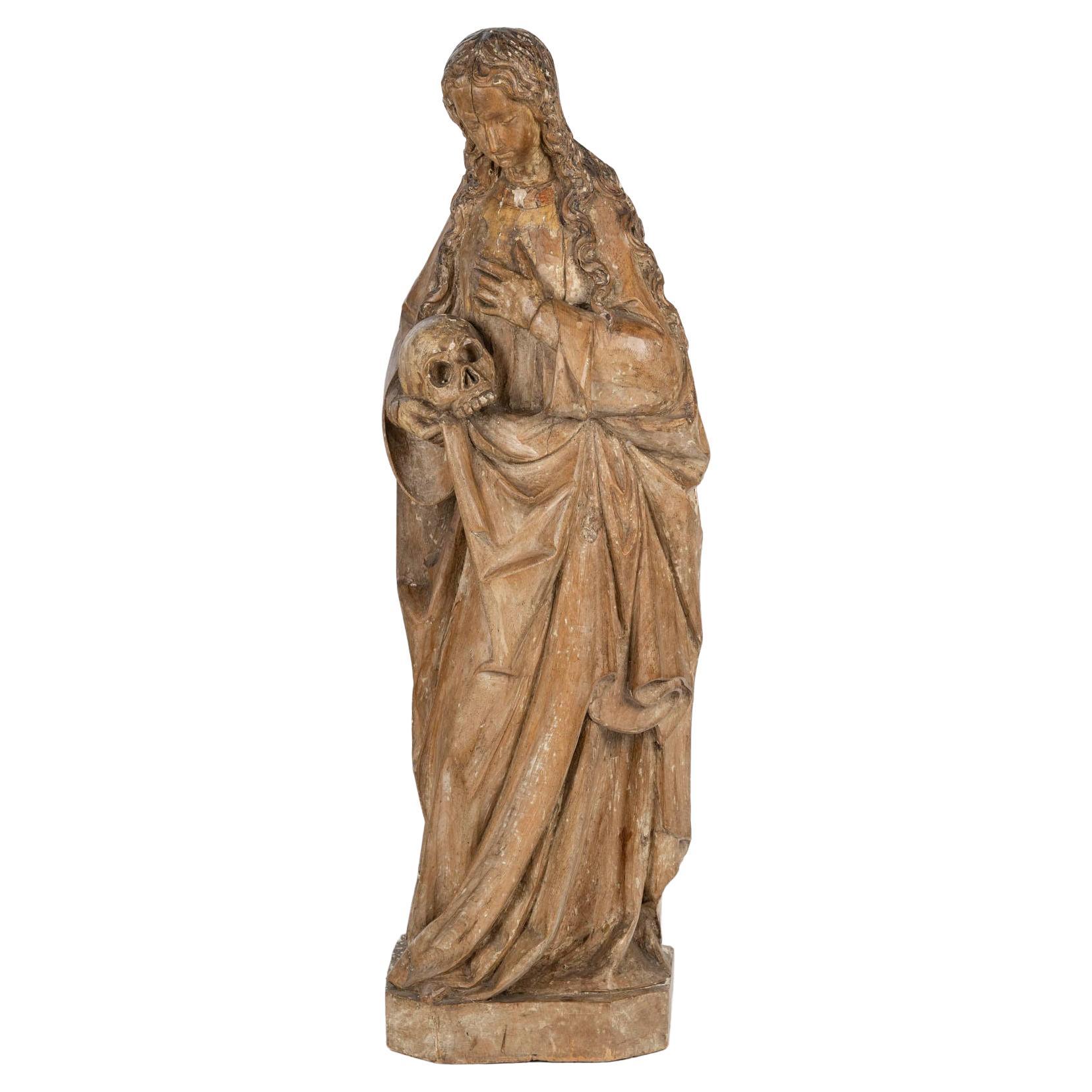 Escultura de madera tallada de María Magdalena, circa 1500.