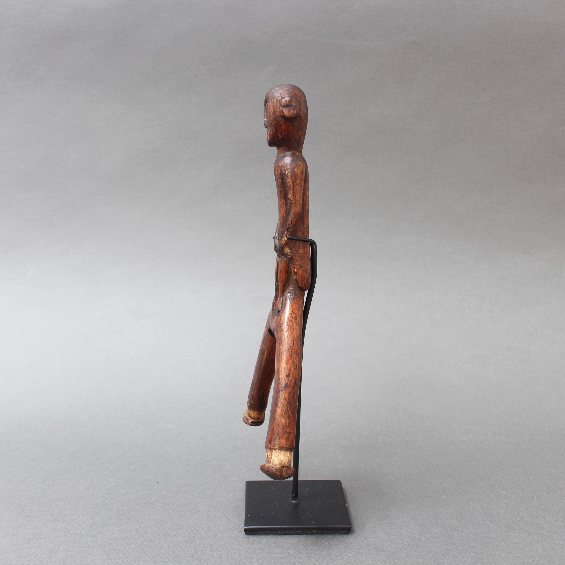 Indonesian Carved Wooden Slingshot Figure from Timor Island, Indonesia, circa 1970s