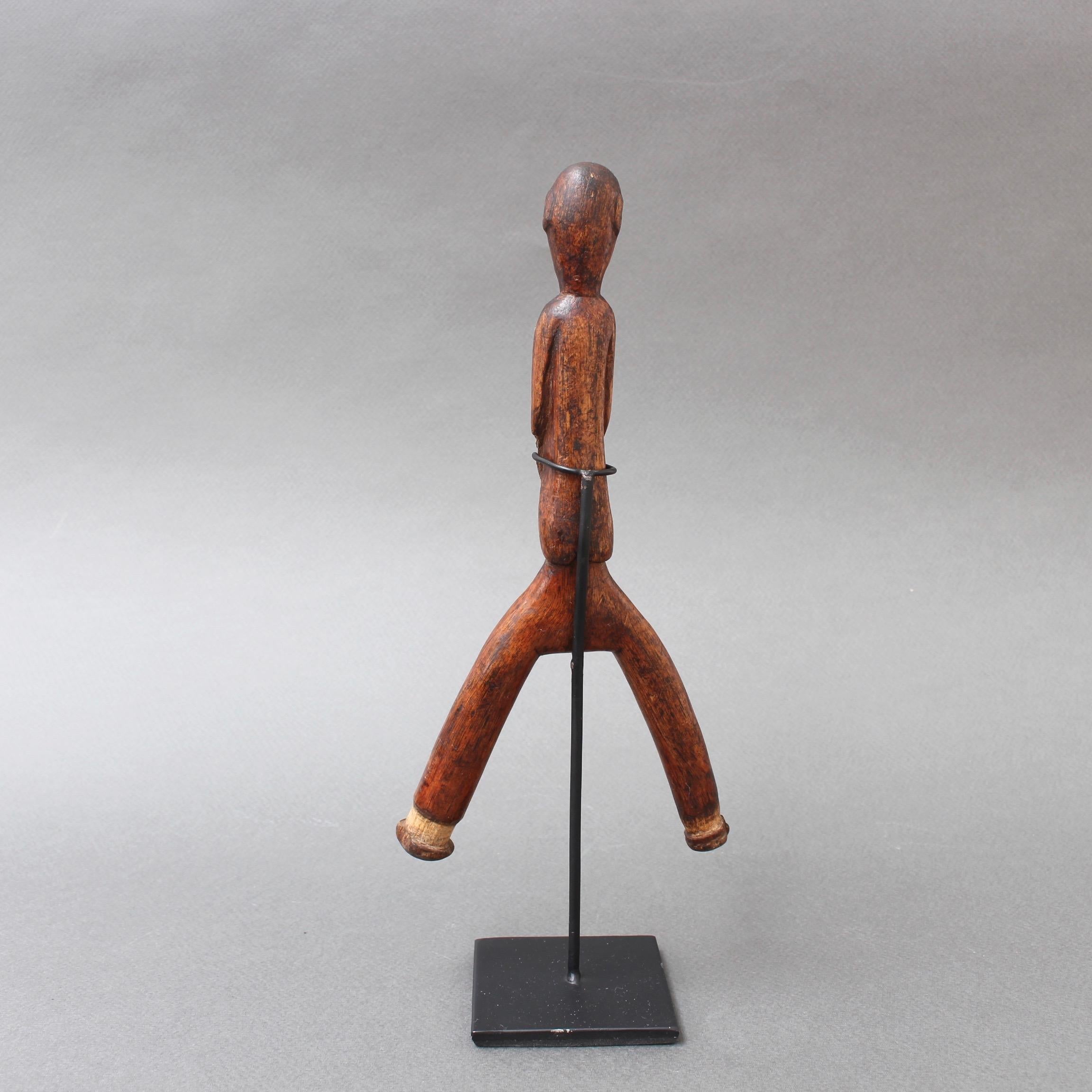 Carved Wooden Slingshot Figure from Timor Island, Indonesia, circa 1970s In Fair Condition In London, GB