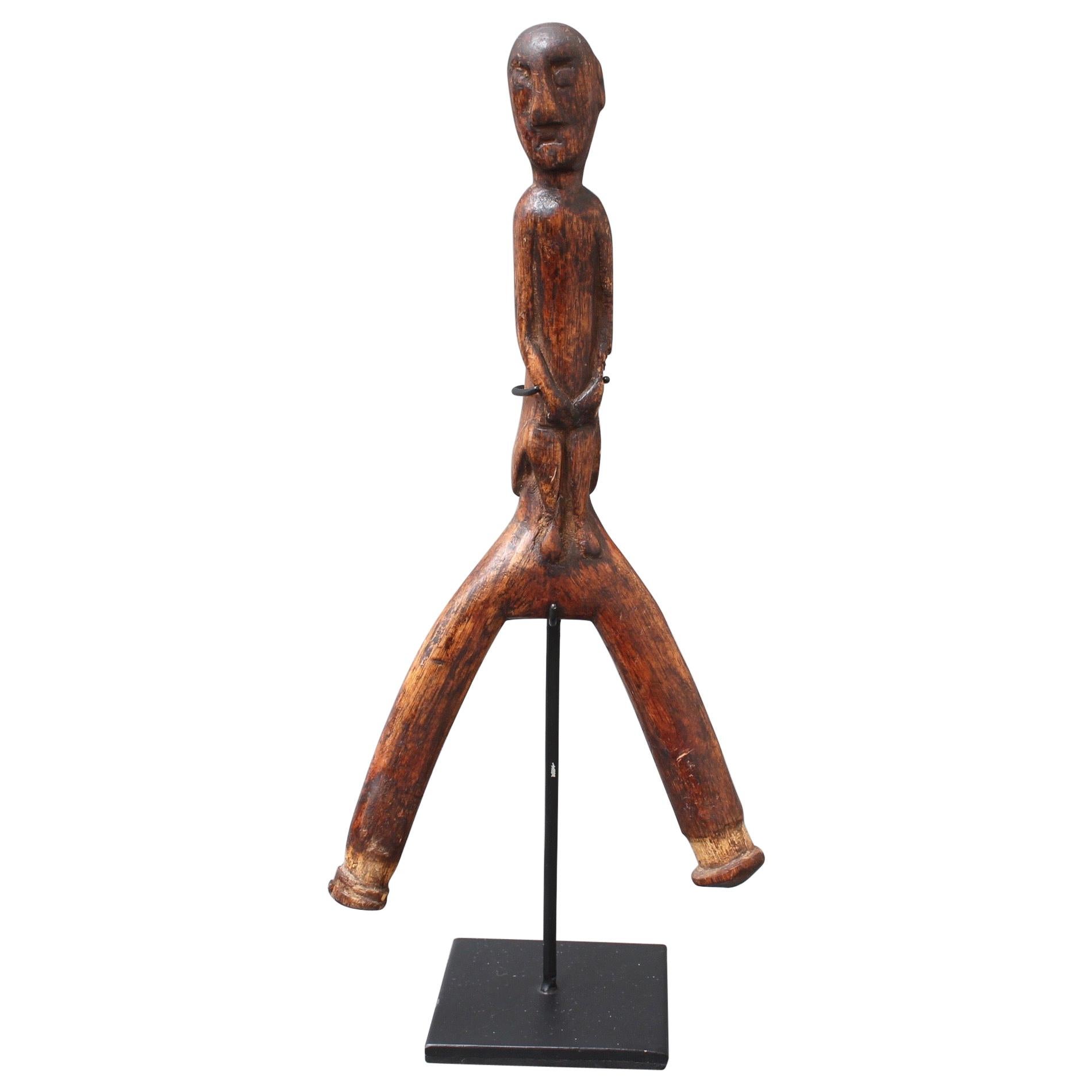 Carved Wooden Slingshot Figure from Timor Island, Indonesia, circa 1970s